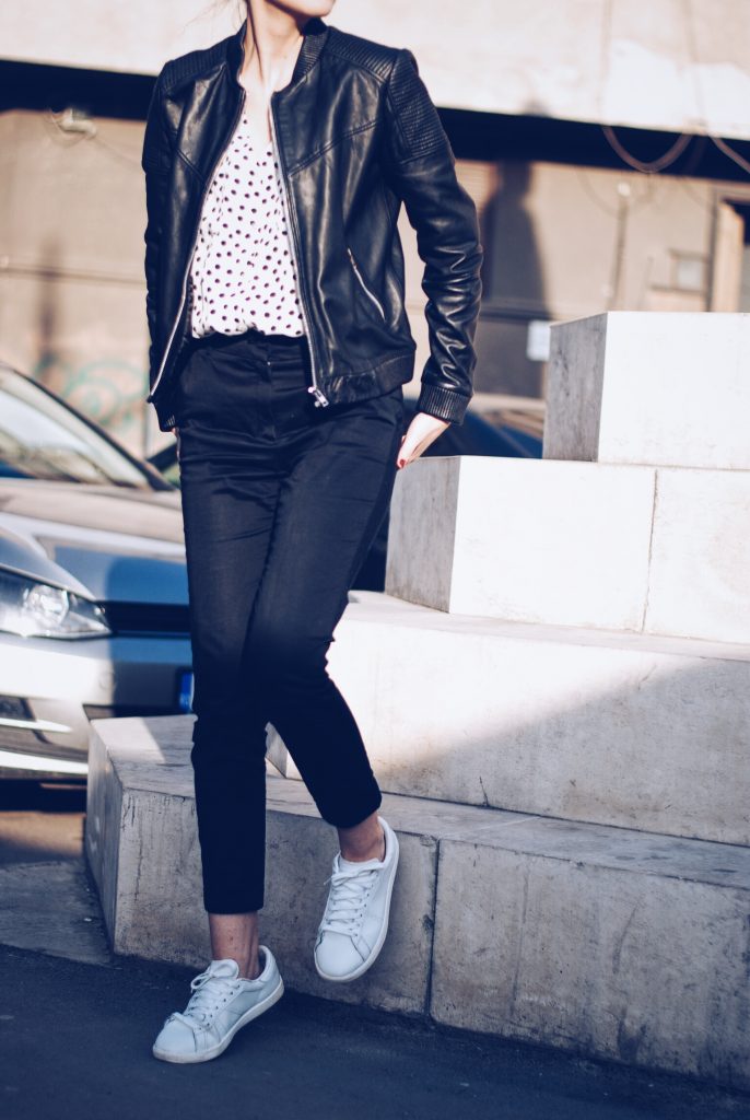 Leather jacket, polka dot shirt, black trousers, white sneakers, so real sunglasses by Andreea Birsan