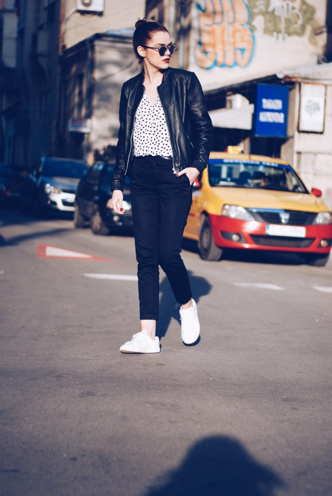 Leather jacket, polka dot shirt, black trousers, white sneakers, so real sunglasses by Andreea Birsan