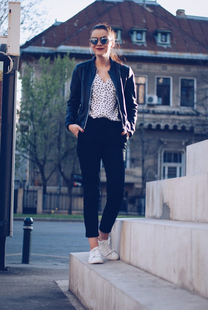 Leather jacket, polka dot shirt, black trousers, white sneakers, so real sunglasses by Andreea Birsan