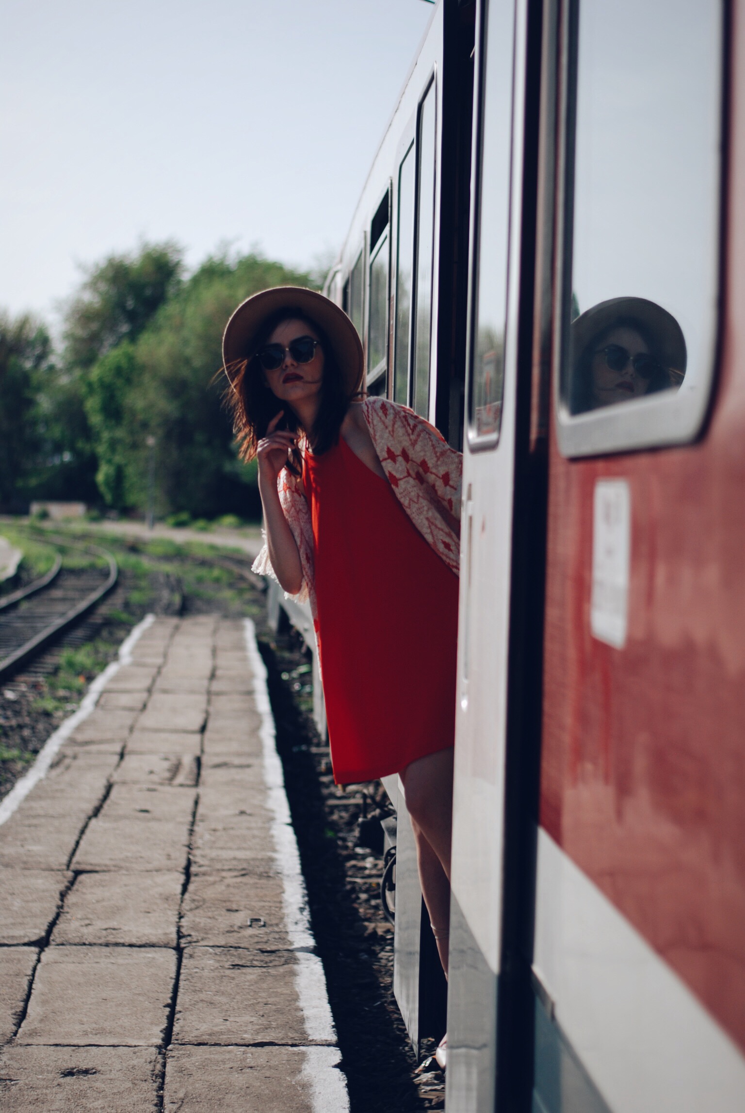 Orange dress, fringed jacket, lace up flats, hat, sunglasses, suede bag by Andreea Birsan