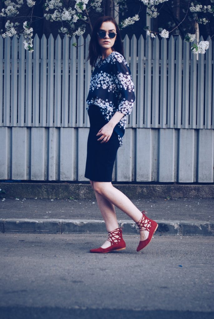 Pencil skirt, floral print blouse, red lace up flats, so real sunglasses by Andreea Birsan