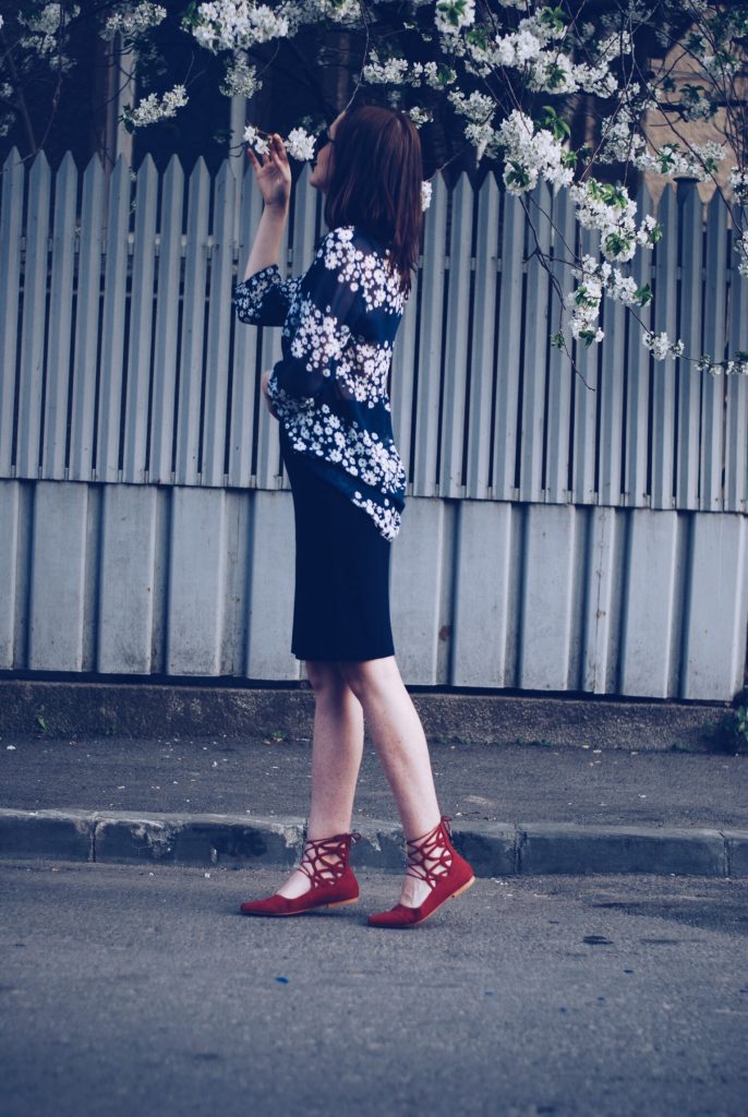 Pencil skirt, floral print blouse, red lace up flats, so real sunglasses by Andreea Birsan