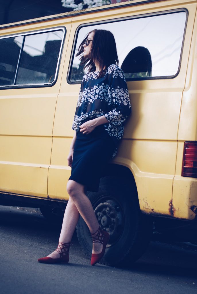 Pencil skirt, floral print blouse, red lace up flats, so real sunglasses by Andreea Birsan