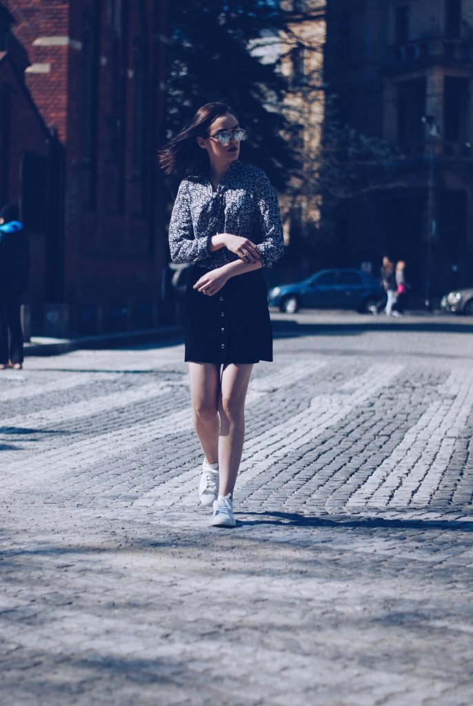 Suede button front skirt, pussy bow blouse, white sneakers by Andreea Birsan