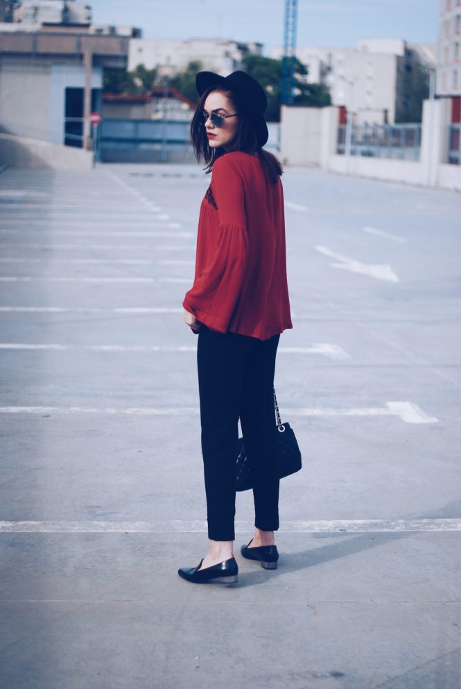 Bell sleeve blouse, black trousers, black hat, leather loafers, leather bag, so real sunglasses, spring outfit by Andreea Birsan