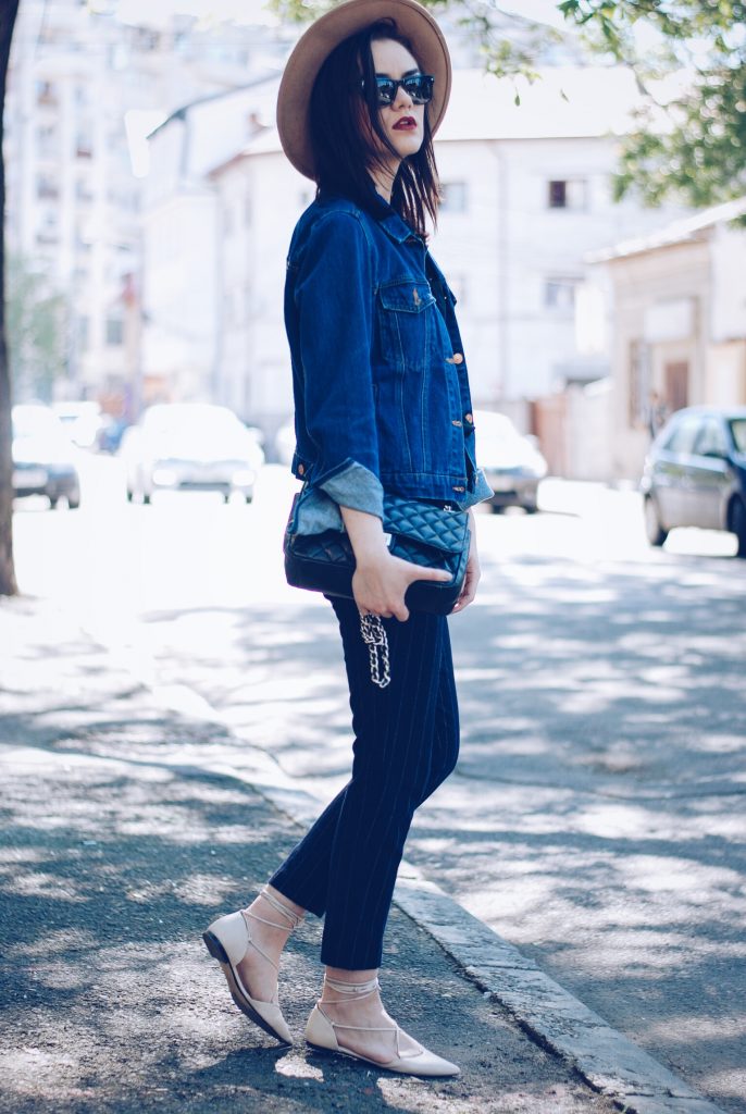 Pinstripe pants, camel hat, black tshirt, denim jacket, sunglasses, beige lace up flats, spring outfit by Andreea Birsan