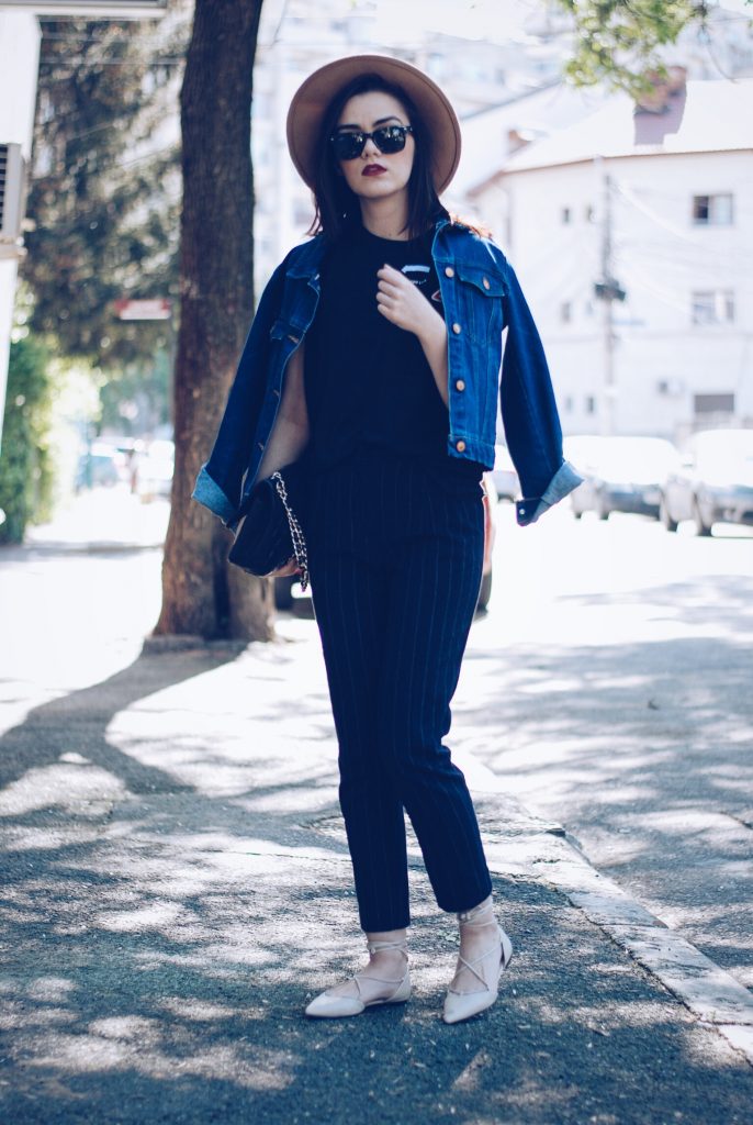 Pinstripe pants, camel hat, black tshirt, denim jacket, sunglasses, beige lace up flats, spring outfit by Andreea Birsan