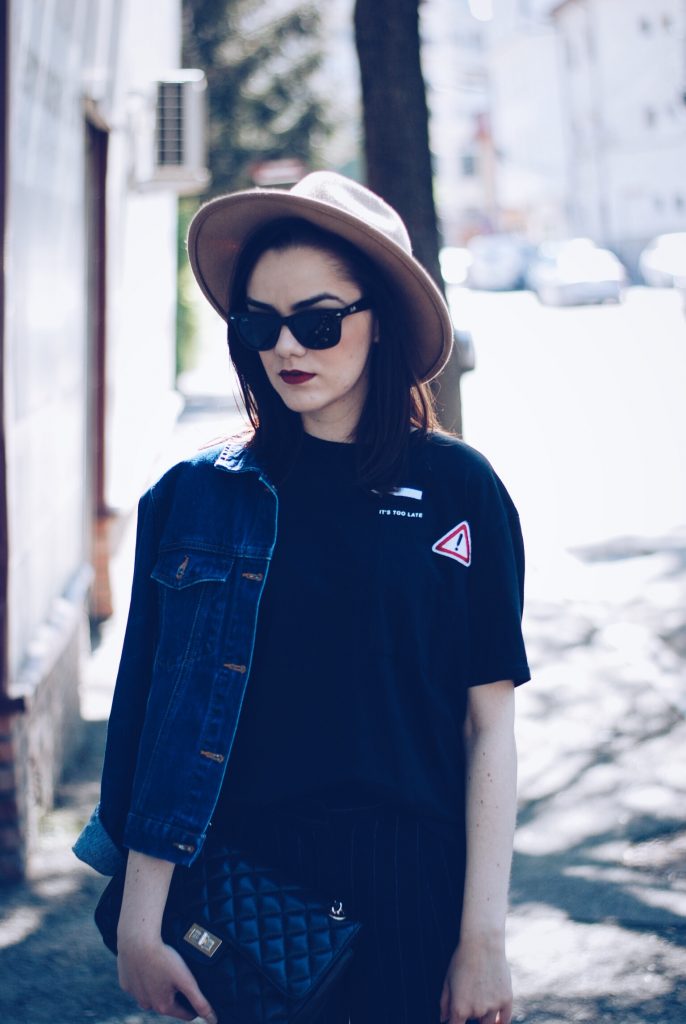 Pinstripe pants, camel hat, black tshirt, denim jacket, sunglasses, beige lace up flats, spring outfit by Andreea Birsan