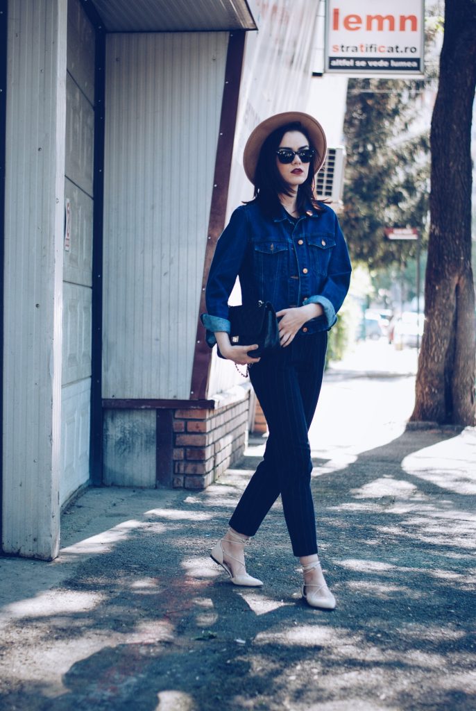 Pinstripe pants, camel hat, black tshirt, denim jacket, sunglasses, beige lace up flats, spring outfit by Andreea Birsan