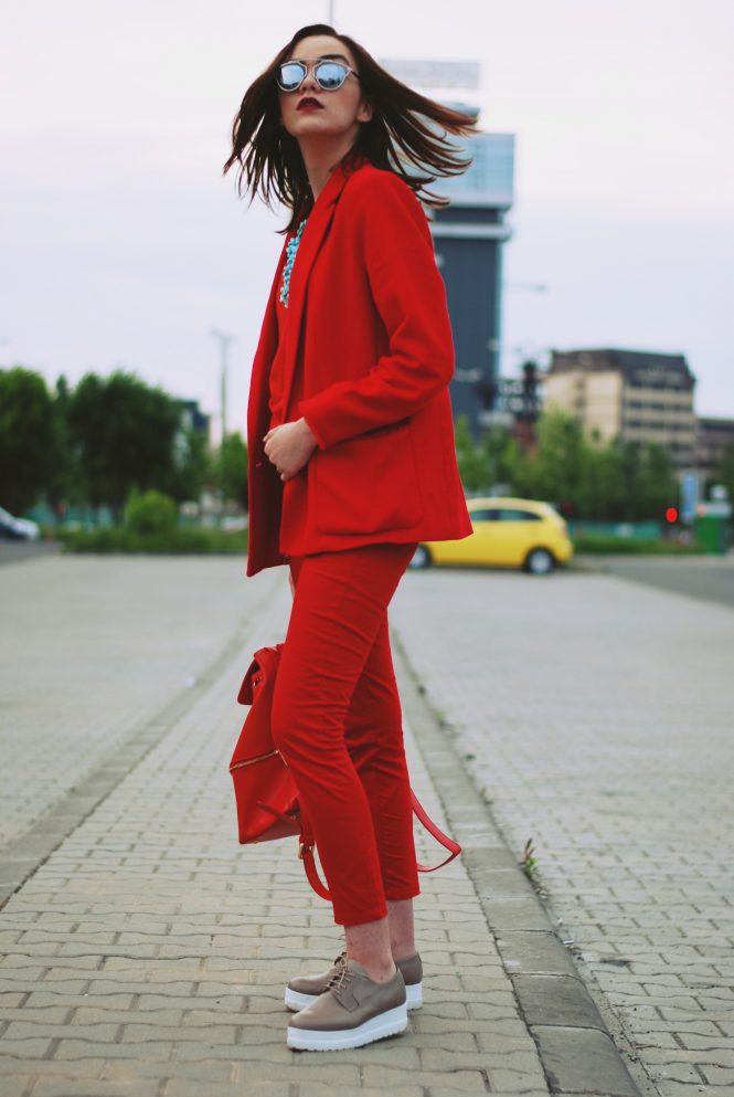 Red trousers, red blazer, red top, nude shoes, red backpack, all red outfit, statement necklace, spring outfit, so real sunglasses by Andreea Birsan