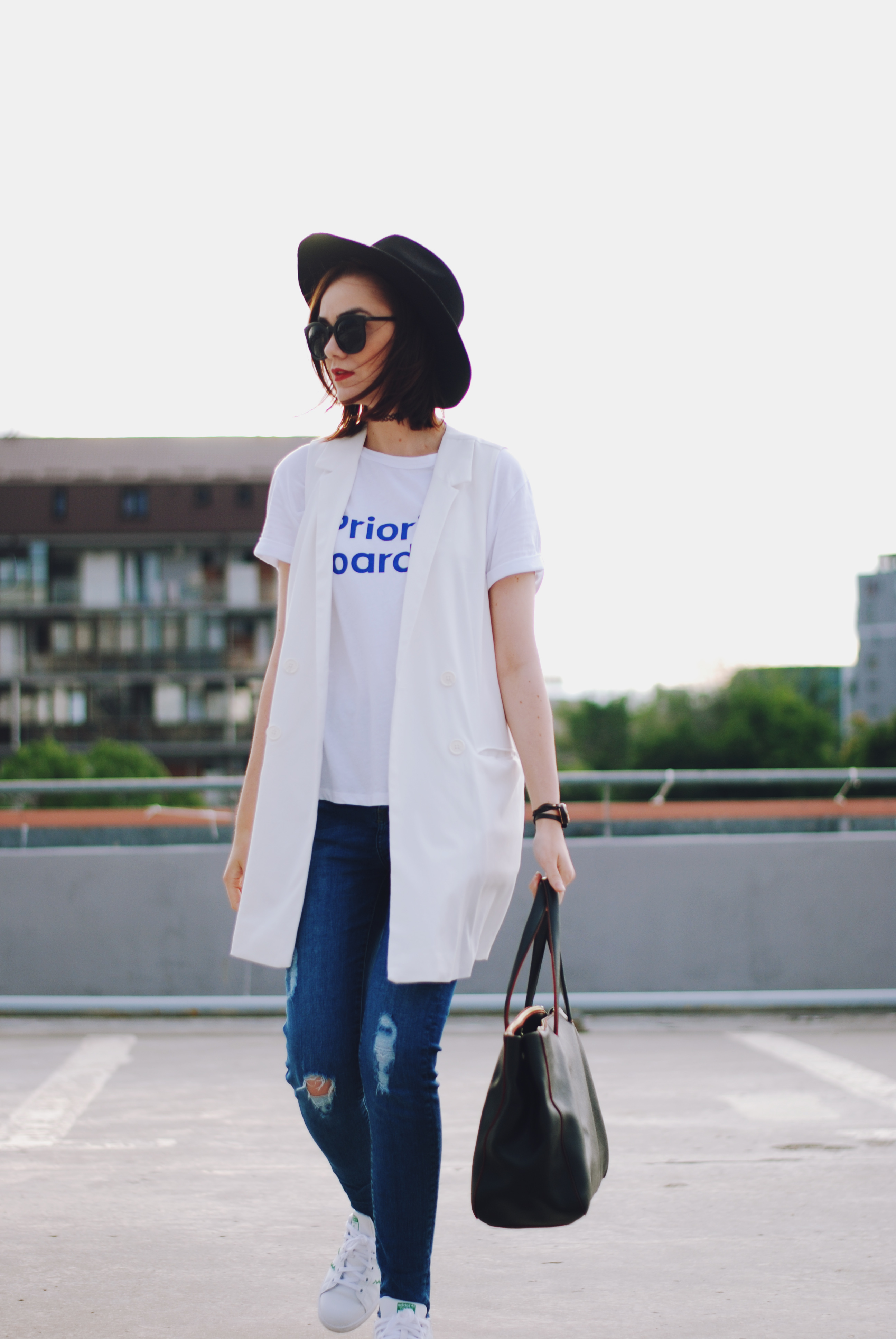 Distressed skinny jeans, white tshirt, white waistcoat vest, stan smith white sneakers, black hat, chocker, black sunglasses, furla black tote, summer outfit, bellabeat leaf, Andreea Birsan