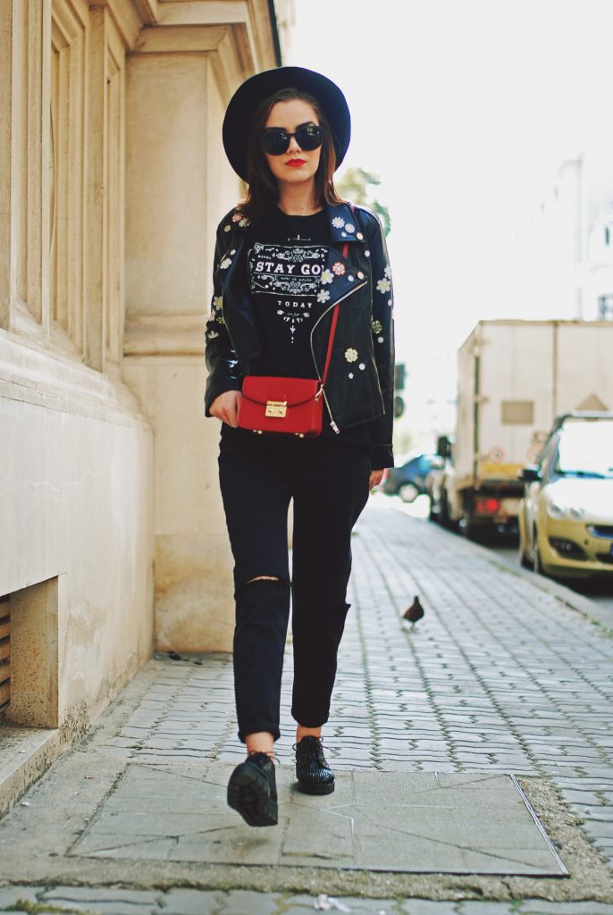 Black mom jeans, printed tshirt, embroidered leather jacket, fedora hat, sunglasses, red crossbody bag, glitter shoes, fall outfit idea, Andreea Birsan