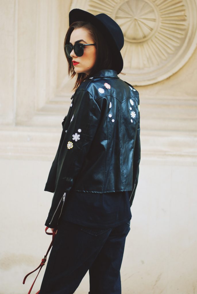 Black mom jeans, printed tshirt, embroidered leather jacket, fedora hat, sunglasses, red crossbody bag, glitter shoes, fall outfit idea, Andreea Birsan