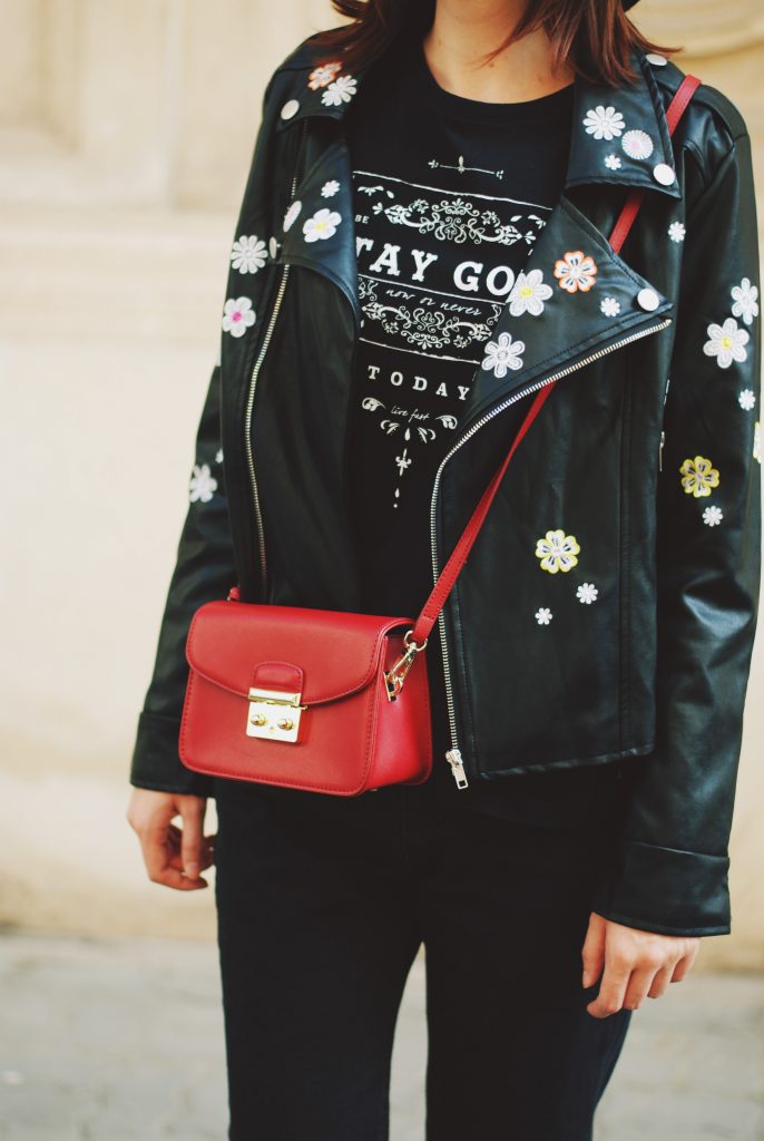 Black mom jeans, printed tshirt, embroidered leather jacket, fedora hat, sunglasses, red crossbody bag, glitter shoes, fall outfit idea, Andreea Birsan