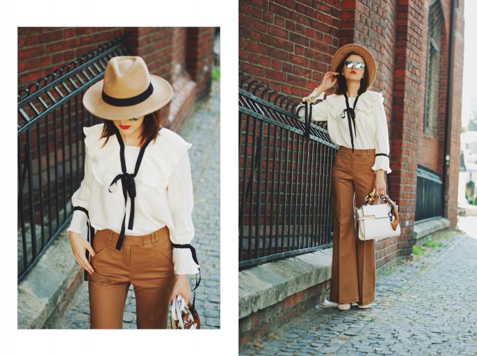 Camel fedora hat, camel flared pants trousers, ruffle top, scarf, white crossbody bag, beige pumps, dior sunglasses, cute autumn outfit idea, Andreea Birsan