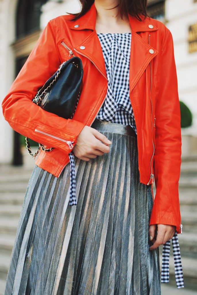 Orange leather jacket, gingham top, silver metallic midi skirt, zara ankle boots, crossbody bag, sunglasses, fall outfit idea, Andreea Birsan