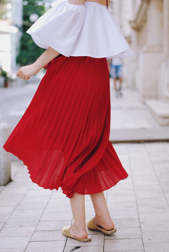 Pleated red midi skirt, white off shoulder top, scarf, red crossbody bag, gold metallic flat mules, dior sunglasses, cute autumn outfit, Andreea Birsan