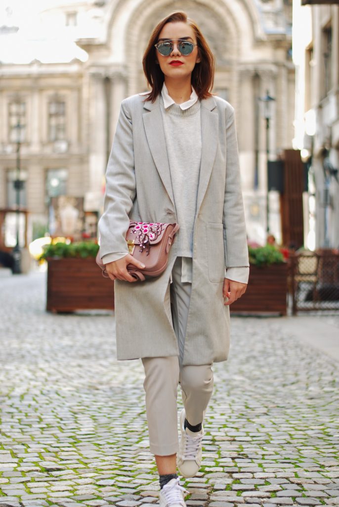 White shirt, grey pants trousers, grey sweater, grey coat, white sneakers, glitter socks, floral crossbody bag, all grey outfit for fall, Andreea Birsan