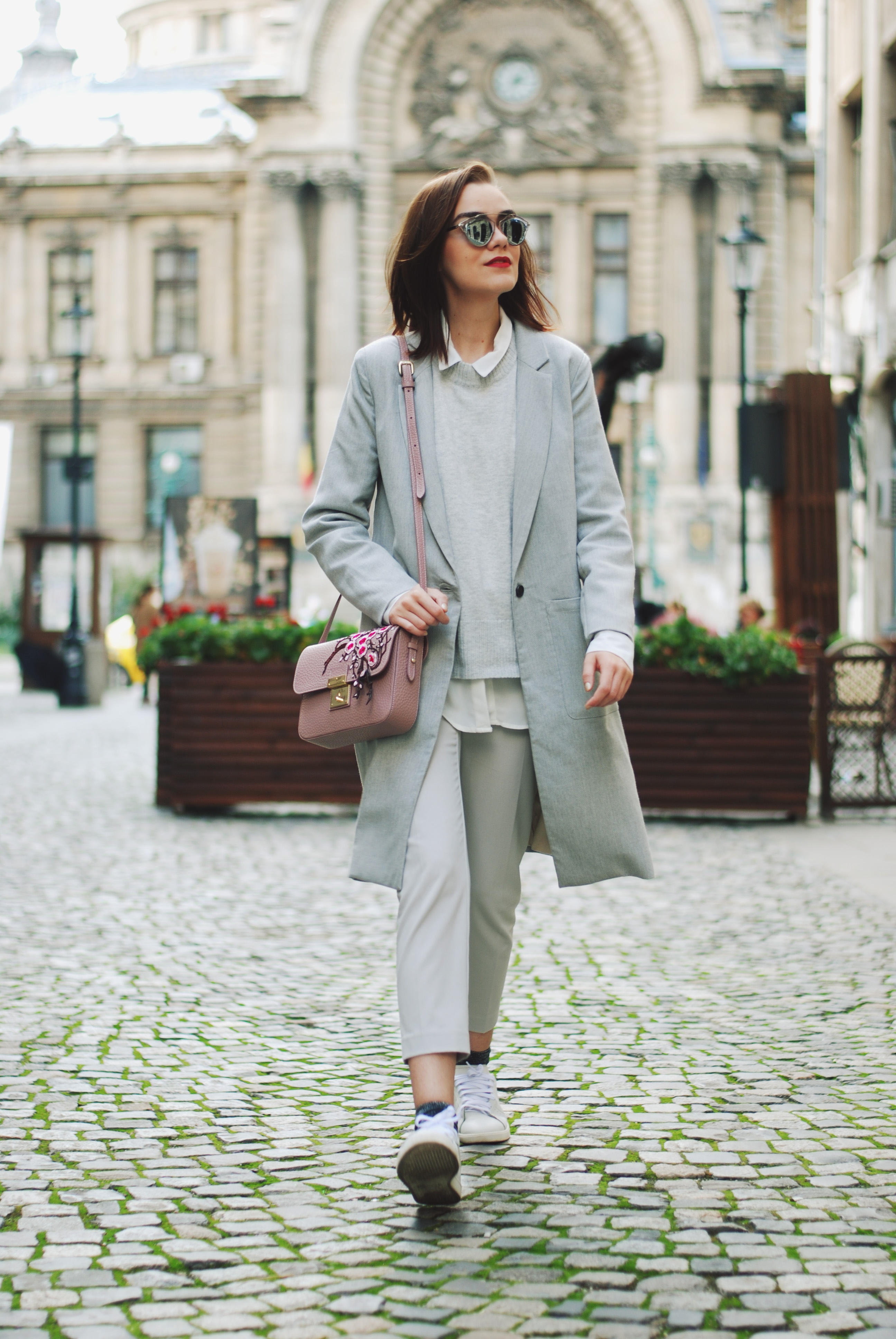 White shirt, grey pants trousers, grey sweater, grey coat, white sneakers, glitter socks, floral crossbody bag, all grey outfit for fall, Andreea Birsan