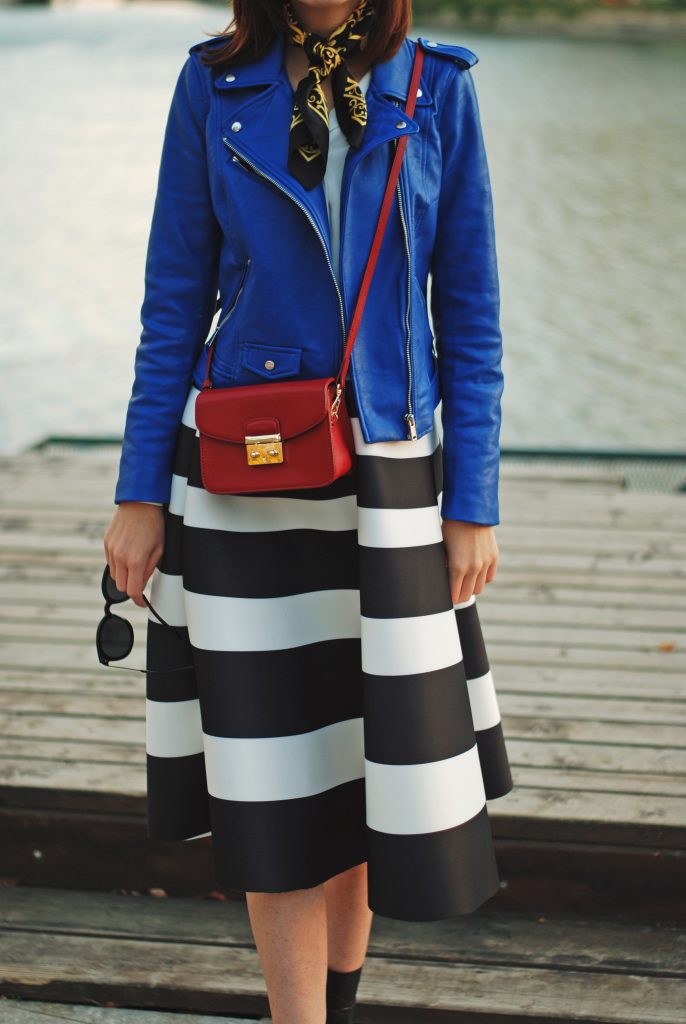 Blue leather jacket, white contrast top, cat eye sunglasses, striped midi skirt, zara leather ankle boots, red crossbody bag, scarf, cute best fall outfit idea, Andreea Birsan