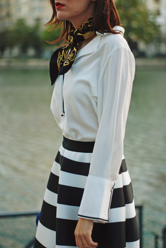 Blue leather jacket, white contrast top, cat eye sunglasses, striped midi skirt, zara leather ankle boots, red crossbody bag, scarf, cute best fall outfit idea, Andreea Birsan