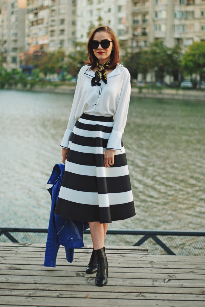 Blue leather jacket, white contrast top, cat eye sunglasses, striped midi skirt, zara leather ankle boots, red crossbody bag, scarf, cute best fall outfit idea, Andreea Birsan