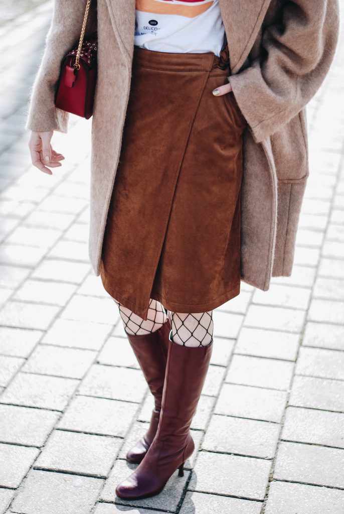 Brown suede midi wrap skirt, graphic tee, fishnet tights, zara navy military hat, tommy hilfiger knee high burgundy boots, furla metropolis red bag, H&M camel beige coat, silver hoop earrings andreea birsan, couturezilla, asos, mango, graphic tshirt, silky scarf, how to look parisian, topshop, fresh casual winter outfit ideas, what to wear a wrap skirt with, how to style knee high boots, pinterest outfits, tumblr outfit, ootd, european fashion blogger, romanian fashion blog