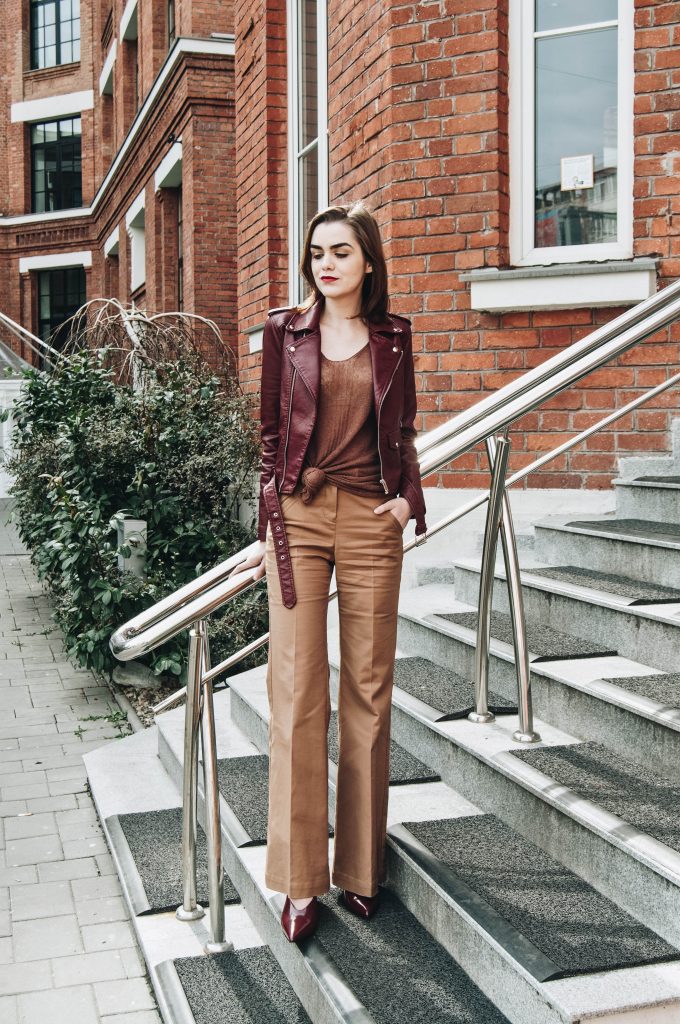 Stefanel wide leg camel pants, flared pants, palazzo pants, burgundy pumps, Zara brown cami, Mango tank top, topshop burgundy leather jacket, Asos pu biker jacket, knotted shirt, vintage retro sunglasses, burgundy leather high heels, andreea birsan, couturezilla, cute spring outfit ideas 2017, spring street style inspiration, how to wear camel, what to wear burgundy with, pumps, casual pinterest outfit for women, chic tumblr girls look, how to look chic on a budget, sale, brown, ootd color combination, how to wear a leather jacket, best outfit inspiration, european fashion blog, romanian fashion blogger, ankle strap stiletto shoes, red lipstick, texture, red brick, fashionista, street wear, fashion trends for spring 2017, ootd, outfit of the day, what to wear