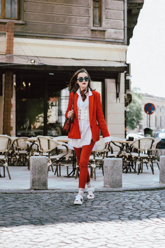 Mango red suit, zara red trousers, asos red blazer, h&m white button down shirt, gucci ace sneakers, white leather sneakers with suit, furla ruby lace metropolis shoulder bag, topshop white fishnet socks, dolce and gabanna blue square sunglasses, andreea birsan, couturezilla, cute spring outfit idea, stradivarius white lace up corset, primark silk scarf, chic on a budget, how to look luxe without breaking the bank, silver hoop earrings, oversize shirt, european spring street style inspiration 2017, fashion trends for spring 2017, fashionista, european fashion blogger, romanian fashion blog, how to wear an all red outfit, power suit, ootd, spring outfit inspo, spring color combination, how to look parisian chic, minimal outfit for women, casual pinterest outfit for women, tumblr girls photos, fashion forward way to styling a suit