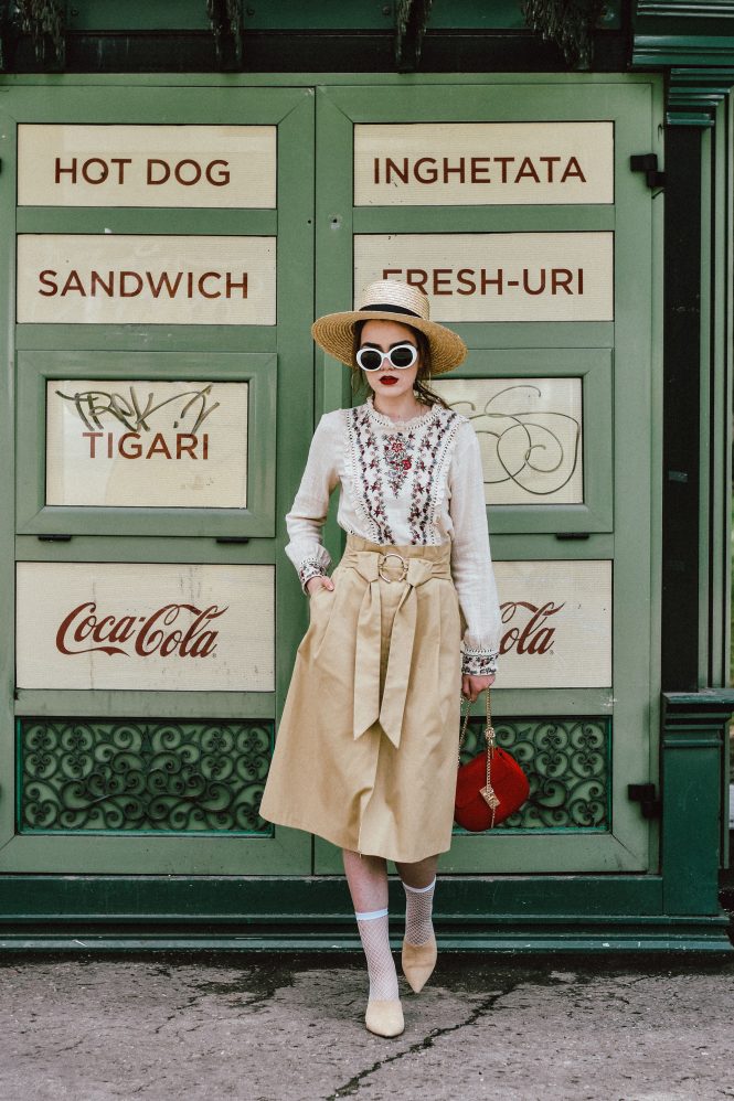 Stradivarius beige deconstructed midi skirt, camel skirt, camel outfit, coca cola, food stand, zara frilled embroidered top, mango ruffled top, asos embroidered blouse, topshop white fishnet socks, rivers island beige suede heeled mules, h&m boater straw hat, fedora straw hat, rayban retro white sunglasses, red chloe drew crossbody bag, red leather crossbody bag, chloe drew lookalike bag, silver hoop earrings, how to wear socks with mules, how to style fishnet socks, how to wear a midi skirt, what to wear with a midi skirt, andreea birsan, couturezilla, cute spring outfit inspiration 2017, what colors to wear for spring, european street style 2017, spring european outfits, european street style, fashion forward outfit for women, cute tumblr girls, chic pinterest outfit for women ideas, outfit inspo, inspiration, fashionista, romanian fashion blog, european fashion blogger, chic on a budget, under 100$ outfit, how to look luxe when you are wearing fast fashion, minimal outfit for women, ootd, outfit of the day, smart casual look, parisian chic women, women with style, bloggers we love