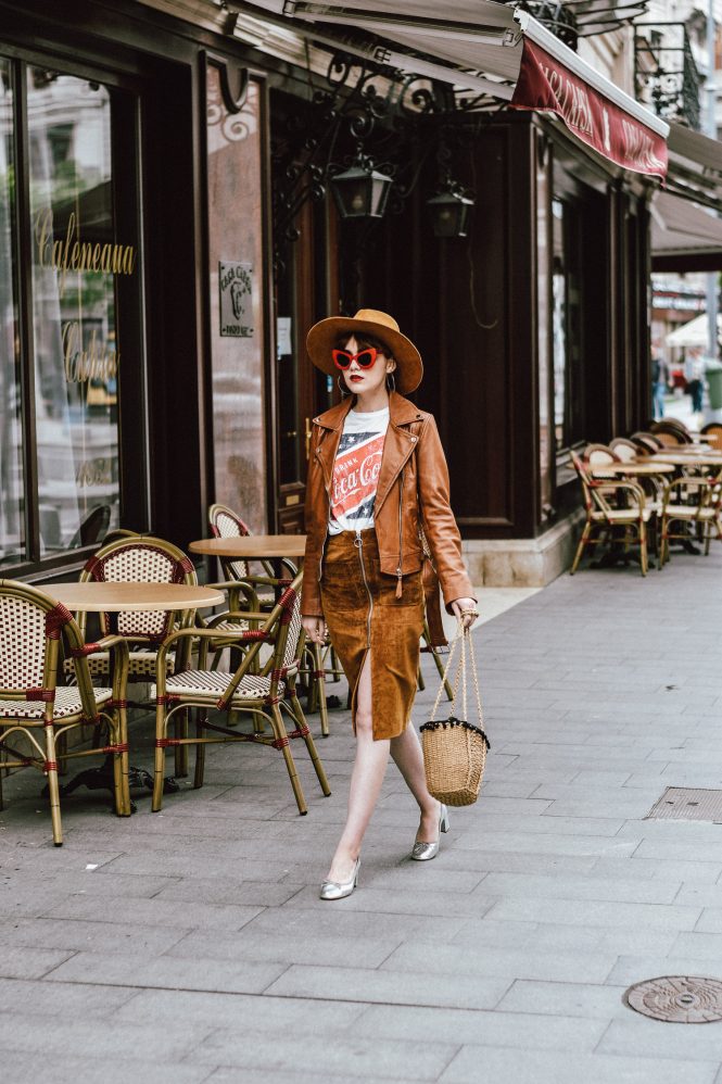 Budget friendly spring and summer outfit ideas 2017, Zara camel leather biker jacket, mango camel suede midi skirt, brown, zip front skirt, what to wear with a midi skirt, how to wear a midi skirt, neutral skirt, neutrals, topshop coca cola t-shirt, asos vintage coke tee, rivers island leather silver metallic pumps, block heel pumps, high heels, urban outfitters straw bag, woven bag, the best bag trend for summer, rafia bag, pom pom bag, biker jacket, camel fedora hat, wide brim hat, red cat eye sunglasses, retro sunglasses, vintage inspired, andreea birsan, couturezilla, parisian chic, silver hoop earrings, european fashion blogger, romanian fashion blog, fashionista, style inspiration, fashion trends for 2017, summer european street style inspiration 2017, what to wear on a chilly day, how to dress, chic outfit ideas for women, pinterest cute outfit for women, minimal outfits inspo, outffit of the day, ootd, how to wear neutrals, what to wear with camel, styling a midi skirt, tumblr girls photos, summer outfit ideas 2017