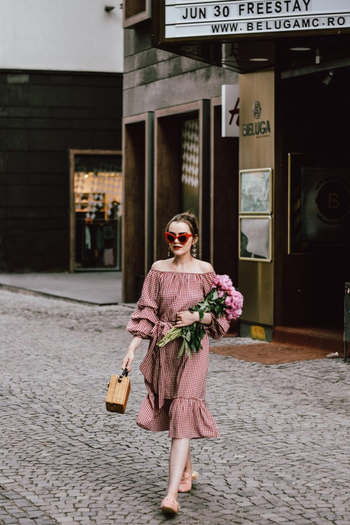 Zara red midi gingham dress, furry pink gucci mules, pink gucci loafers, blush pink, gucci slippers, slides, gucci lookalike shoes, dupes, asos square straw bag, topshop woven bag, river island summer bag, mango chic dress, ray ban retro cat eye red sunglasses, fresh peonies, flowers, blooms, pink peonies, jewelry, boohoo star earrings, andreea birsan, couturezilla, cute summer outfit ideas 2017, spring outfit inspiration, outfit inspo, ootd, outfit of the day, fashion trends for summer 2017, fashionista, european fashion blogger, romanian fashion blog, summer european street style, how to wear a midi gingham dress with slides, how to wear a midi dress, the best gingham dresses, gingham the hottest summer trend, messy bun, how to look parisian, italiana, parisian chic, cinematic, old center bucharest, summer in europe, chic lady, chic on a budget, feminine summer outfits, how to wear gingham like a pro, casual pinterest outfit for women, happy tumblr girls photos, pictures, urban decay red lipstick, summer style inspiration, how to wear red and pink, cuttest summer bags, the best bags for summer, tie bow dress, ruffle sleeves, frilled hem dress