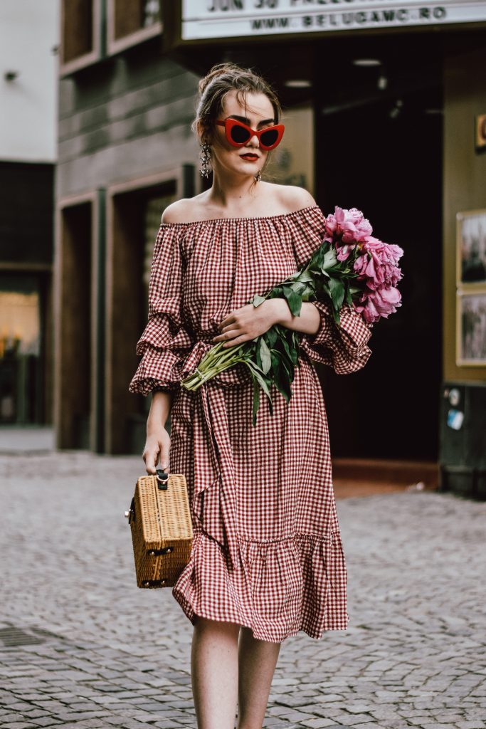 Zara red midi gingham dress, furry pink gucci mules, pink gucci loafers, blush pink, gucci slippers, slides, gucci lookalike shoes, dupes, asos square straw bag, topshop woven bag, river island summer bag, mango chic dress, ray ban retro cat eye red sunglasses, fresh peonies, flowers, blooms, pink peonies, jewelry, boohoo star earrings, andreea birsan, couturezilla, cute summer outfit ideas 2017, spring outfit inspiration, outfit inspo, ootd, outfit of the day, fashion trends for summer 2017, fashionista, european fashion blogger, romanian fashion blog, summer european street style, how to wear a midi gingham dress with slides, how to wear a midi dress, the best gingham dresses, gingham the hottest summer trend, messy bun, how to look parisian, italiana, parisian chic, cinematic, old center bucharest, summer in europe, chic lady, chic on a budget, feminine summer outfits, how to wear gingham like a pro, casual pinterest outfit for women, happy tumblr girls photos, pictures, urban decay red lipstick, summer style inspiration, how to wear red and pink, cuttest summer bags, the best bags for summer, tie bow dress, ruffle sleeves, frilled hem dress