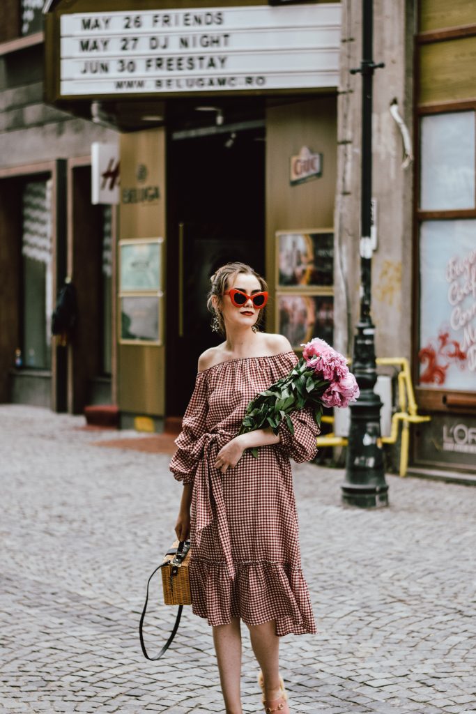 Zara red midi gingham dress, furry pink gucci mules, pink gucci loafers, blush pink, gucci slippers, slides, gucci lookalike shoes, dupes, asos square straw bag, topshop woven bag, river island summer bag, mango chic dress, ray ban retro cat eye red sunglasses, fresh peonies, flowers, blooms, pink peonies, jewelry, boohoo star earrings, andreea birsan, couturezilla, cute summer outfit ideas 2017, spring outfit inspiration, outfit inspo, ootd, outfit of the day, fashion trends for summer 2017, fashionista, european fashion blogger, romanian fashion blog, summer european street style, how to wear a midi gingham dress with slides, how to wear a midi dress, the best gingham dresses, gingham the hottest summer trend, messy bun, how to look parisian, italiana, parisian chic, cinematic, old center bucharest, summer in europe, chic lady, chic on a budget, feminine summer outfits, how to wear gingham like a pro, casual pinterest outfit for women, happy tumblr girls photos, pictures, urban decay red lipstick, summer style inspiration, how to wear red and pink, cuttest summer bags, the best bags for summer, tie bow dress, ruffle sleeves, frilled hem dress