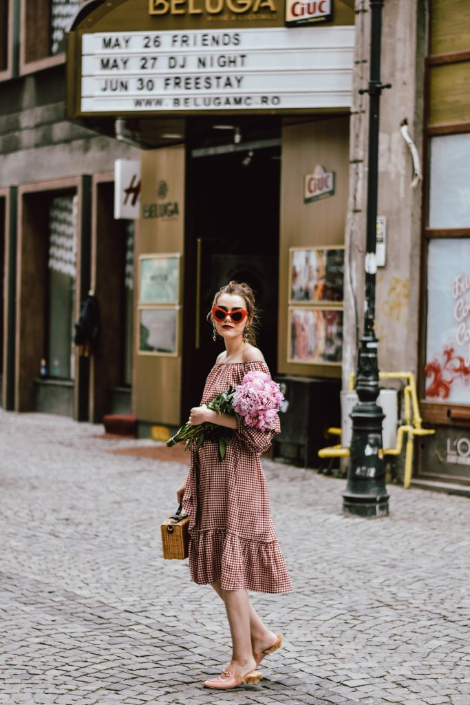 Zara red midi gingham dress, furry pink gucci mules, pink gucci loafers, blush pink, gucci slippers, slides, gucci lookalike shoes, dupes, asos square straw bag, topshop woven bag, river island summer bag, mango chic dress, ray ban retro cat eye red sunglasses, fresh peonies, flowers, blooms, pink peonies, jewelry, boohoo star earrings, andreea birsan, couturezilla, cute summer outfit ideas 2017, spring outfit inspiration, outfit inspo, ootd, outfit of the day, fashion trends for summer 2017, fashionista, european fashion blogger, romanian fashion blog, summer european street style, how to wear a midi gingham dress with slides, how to wear a midi dress, the best gingham dresses, gingham the hottest summer trend, messy bun, how to look parisian, italiana, parisian chic, cinematic, old center bucharest, summer in europe, chic lady, chic on a budget, feminine summer outfits, how to wear gingham like a pro, casual pinterest outfit for women, happy tumblr girls photos, pictures, urban decay red lipstick, summer style inspiration, how to wear red and pink, cuttest summer bags, the best bags for summer, tie bow dress, ruffle sleeves, frilled hem dress