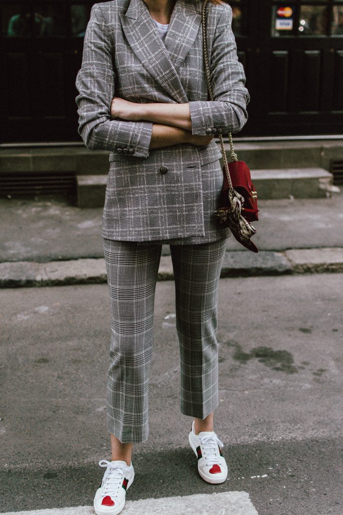 Zara check printed suit, mango check printed blazer,topshop checked flared trousers, checked suit, cropped trousers, gucci white ace heart embroidered sneakers, furla metropolis red bag, coke tee, coca cola t-shirt, andreea birsan, couturezilla, cute fall outfit ideas 2017, check suit, edgy outfit for women, silk scarf, red retro sunglasses, big sunglasses, tomboy chic outfit, how to style a suit, what to wear with a women suit, how to make a suit look casual chic, how to make an outfit look edgy, how to wear a suit with sneakers, sneakers and suits, white shoes, white leather sneakers, statement sneakers, lips printed earrings, statement earrings, red cat eye sunglasses, sunnies, fall outfit ideas for women 2017, transitional outfit ideas, transitional ootd, transitioning into autumn, autumn 2017, moody photoshoot, how to look Parisian chic, European summer street style inspiration for women 2017, pinterest chic outfit ideas for woman, summer outfit ideas, summer ootd inspiration, outfit of the day, ootd, fashion icon, style inspiration, fashionista, fashion inspiration, style inspo, what to wear in summer, how to look French, chic on a budget, zara outfit, mango, topshop, asos, river island, forever 21, urban outfitters, how to mix high end pieces with luxury ones, zara and Gucci,outfit alternatives for summer, tomboy chic, minimal outfit, tumblr girls photos, pictures, happy girl, women, smart casual outfits, the best outfit ideas 2017, what to wear when you don’t feel inspired, summer in Europe, weekend attire, uniform, French women in summer, European outfit ideas 2017, minimal chic outfit, how to stand out, the best outfit ideas for summer, the sunglasses you have seen everywhere on Instagram, glasses, uk fashion blogger, united kingdom, uk fashion blog, fashion and travel blog, Europe, women with style, street style, summer fashion trends 2017, best fashion ideas, styling, fall in europe