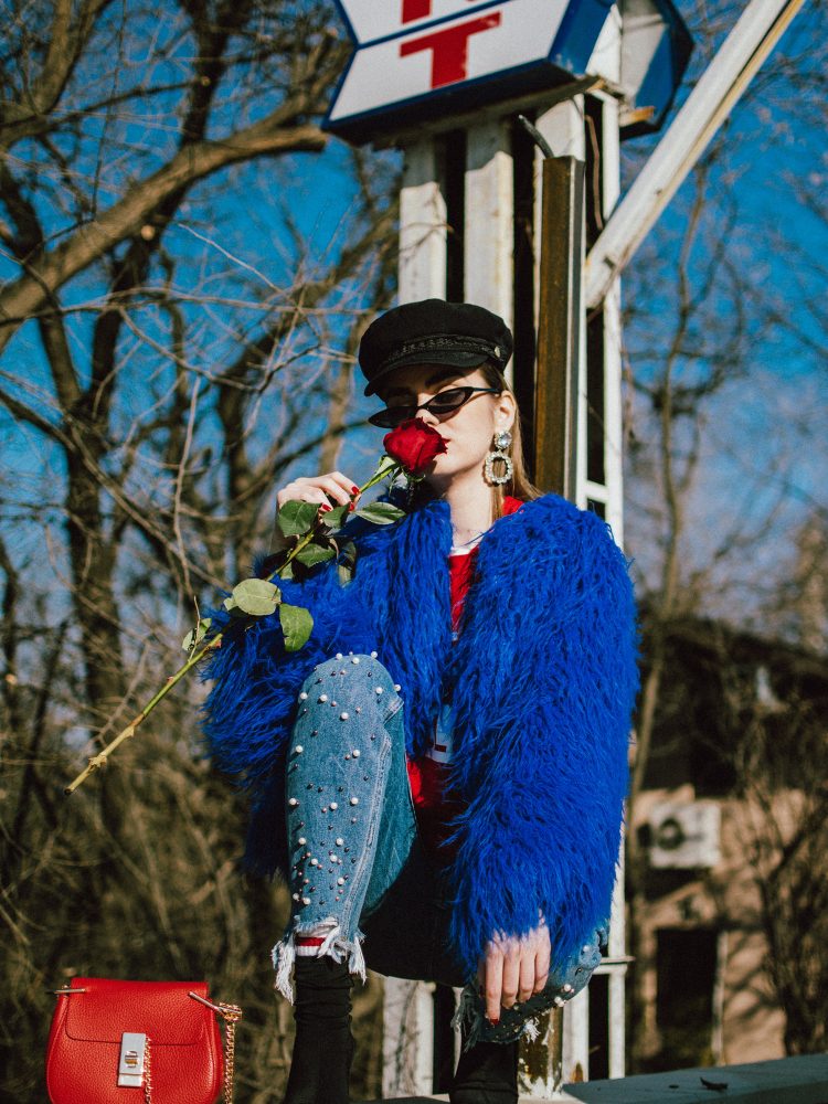 Boohoo blue mongolian fur jacket, cobalt faux fur jacket, fur coat, popular zara pearl jeans, step hem zara jeans with pearls, how to wear mom jeans like a pro. red sweatshirt, asos small cat eye sunglasses, black heeled sock boots, red chloe drew bag, baker boy hat, andreea birsan, couturezilla, cute winter outfit ideas 2018, where to find the best mom jeans, best jeans with pearls, pearl embellished denim, distressed denim, jeans, red and blue outfit, how to mix red and blue, balenciaga lookalike sock boots, knife boots, the best sock boots under 50$, red sweatshirt with print, how to mix athleisure clothes in a cool look, statement earrings, rhinestones, fun 90s socks, how to wear the retro sunglasses like a fashion blogger, 90s sunglasses, micro sunglasses trend, red chloe drew dupe, red chloe drew shoulder bag lookalike, pearl embellishements, the best way to wear red and blue this winter, roses, how to look Parisian chic, European summer street style inspiration for women 2017, pinterest chic outfit ideas for woman, summer outfit ideas, summer ootd inspiration, outfit of the day, ootd, fashion icon, style inspiration, fashionista, fashion inspiration, style inspo, what to wear in summer, how to look French, chic on a budget, zara outfit, mango, topshop, asos, river island, forever 21, urban outfitters, how to mix high end pieces with luxury ones, zara and Gucci,outfit alternatives for summer, tomboy chic, minimal outfit, tumblr girls photos, pictures, happy girl, women, smart casual outfits, the best outfit ideas 2017, what to wear when you don’t feel inspired, summer in Europe, weekend attire, uniform, French women in summer, European outfit ideas 2017, minimal chic outfit, how to stand out, the best outfit ideas for summer, the sunglasses you have seen everywhere on Instagram, glasses, uk fashion blogger, united kingdom, uk fashion blog, fashion and travel blog, Europe, women with style, street style, summer fashion trends 2017, best fashion ideas, styling, fall fashion, fall outfit, fall ootd, fall perfect, transitional dressing, best transitional outfit ideas, how to wear statement earrings, dressing for autumn, autumn outfit, winter outfit ideas for work and school 2017