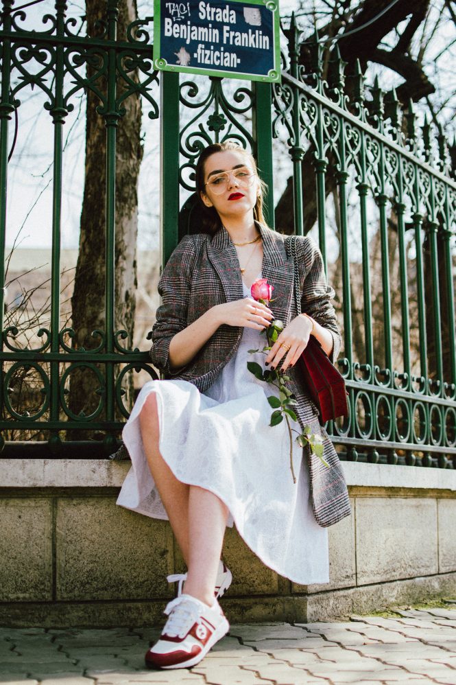 Guess white midi dress, oversized checked blazer, check printed oversized blazer, blazer over dress edgy outfit, gucci dionysus red suede shoulder bag, gucci white and red leather sneakers, andreea birsan, couturezilla, cute spring outfit ideas 2018, gucci trainers, white kicks, geeky clear lens glasses trend, the zara aviator glasses, feminine white dress, skater dress, little white dress, how to create an edgy outfit, feminine dress, masculine blazer, boyfriend blazer, pandora gold jewelry, pandora shine, clear lens glasses trend, chic outfit ideas for spring 2018, work appropriate outfit 2018, how to look Parisian chic, European summer street style inspiration for women 2017, pinterest chic outfit ideas for woman, summer outfit ideas, summer ootd inspiration, outfit of the day, ootd, fashion icon, style inspiration, fashionista, fashion inspiration, style inspo, what to wear in summer, how to look French, chic on a budget, zara outfit, mango, topshop, asos, river island, forever 21, urban outfitters, how to mix high end pieces with luxury ones, zara and Gucci,outfit alternatives for summer, tomboy chic, minimal outfit, tumblr girls photos, pictures, happy girl, women, smart casual outfits, the best outfit ideas 2017, what to wear when you don’t feel inspired, summer in Europe, weekend attire, uniform, French women in summer, European outfit ideas 2017, minimal chic outfit, how to stand out, the best outfit ideas for summer, the sunglasses you have seen everywhere on Instagram, glasses, uk fashion blogger, united kingdom, uk fashion blog, fashion and travel blog, Europe, women with style, street style, summer fashion trends 2017, best fashion ideas, styling, fall fashion, fall outfit, fall ootd, fall perfect, transitional dressing, best transitional outfit ideas, how to wear statement earrings, dressing for autumn, autumn outfit, winter outfit ideas for work and school 2017, grey blazer