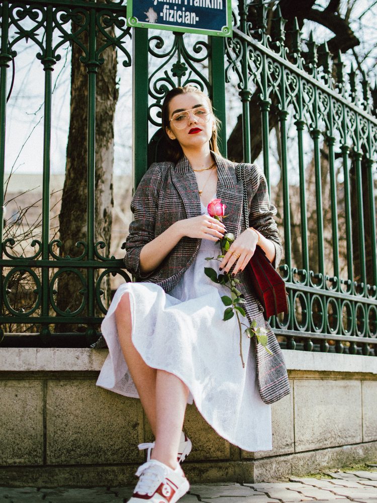 Guess white midi dress, oversized checked blazer, check printed oversized blazer, blazer over dress edgy outfit, gucci dionysus red suede shoulder bag, gucci white and red leather sneakers, andreea birsan, couturezilla, cute spring outfit ideas 2018, gucci trainers, white kicks, geeky clear lens glasses trend, the zara aviator glasses, feminine white dress, skater dress, little white dress, how to create an edgy outfit, feminine dress, masculine blazer, boyfriend blazer, pandora gold jewelry, pandora shine, clear lens glasses trend, chic outfit ideas for spring 2018, work appropriate outfit 2018, how to look Parisian chic, European summer street style inspiration for women 2017, pinterest chic outfit ideas for woman, summer outfit ideas, summer ootd inspiration, outfit of the day, ootd, fashion icon, style inspiration, fashionista, fashion inspiration, style inspo, what to wear in summer, how to look French, chic on a budget, zara outfit, mango, topshop, asos, river island, forever 21, urban outfitters, how to mix high end pieces with luxury ones, zara and Gucci,outfit alternatives for summer, tomboy chic, minimal outfit, tumblr girls photos, pictures, happy girl, women, smart casual outfits, the best outfit ideas 2017, what to wear when you don’t feel inspired, summer in Europe, weekend attire, uniform, French women in summer, European outfit ideas 2017, minimal chic outfit, how to stand out, the best outfit ideas for summer, the sunglasses you have seen everywhere on Instagram, glasses, uk fashion blogger, united kingdom, uk fashion blog, fashion and travel blog, Europe, women with style, street style, summer fashion trends 2017, best fashion ideas, styling, fall fashion, fall outfit, fall ootd, fall perfect, transitional dressing, best transitional outfit ideas, how to wear statement earrings, dressing for autumn, autumn outfit, winter outfit ideas for work and school 2017, grey blazer