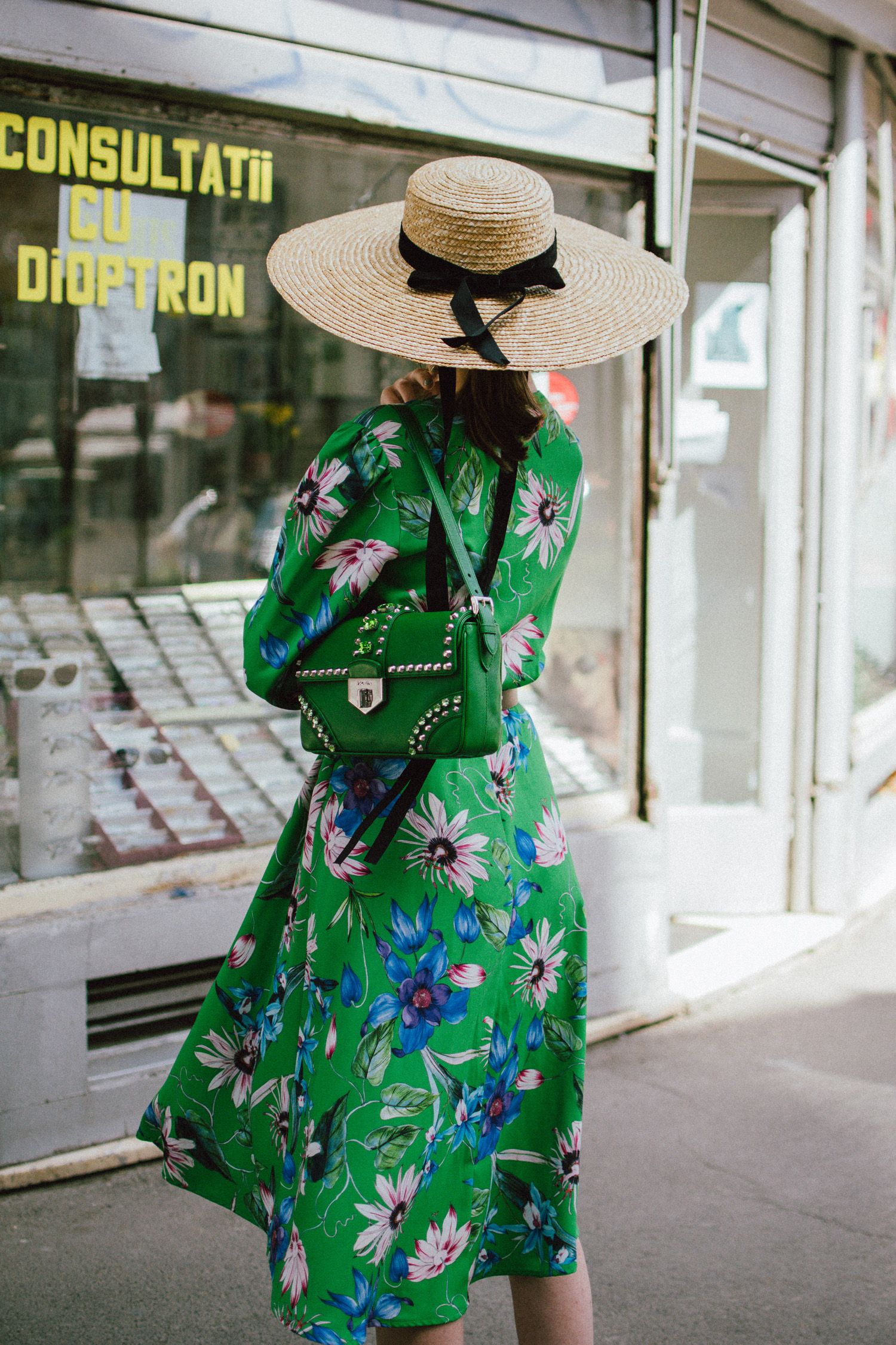 Green midi floral dress, gucci ace heart embroidered sneakers, prada green leather shoulder bag, mango big straw hat, andreea birsan, couturezilla, cute spring outfit ideas 2018, h&m midi floral dress, budget friendly dress for spring and summer, how to wear green, what to wear with a floral dress, dress and sneakers, asos micro cat eye sunglasses, small cat eye sunglasses, matrix inspired sunglasses, the micro sunglasses trend, statement earrings, how to wear the small sunglasses trend, 90s inspired sunglasses, black cat eye sunglasses, how to wear floral prints, flower print dress, green dress, how to wear midi dresses, what shoes work with midi dresses, straw hat, large brim straw hat, leather belt, gucci white sneakers, white leather sneakers, gucci white sneakers with hearts, gucci ace, prada saffiano leather shoulder bag, green prada shoulder bag with studs and stones, green bag and green dresss, how to look Parisian chic, European summer street style inspiration for women 2017, pinterest chic outfit ideas for woman, summer outfit ideas, summer ootd inspiration, outfit of the day, ootd, fashion icon, style inspiration, fashionista, fashion inspiration, style inspo, what to wear in summer, how to look French, chic on a budget, zara outfit, mango, topshop, asos, river island, forever 21, urban outfitters, how to mix high end pieces with luxury ones, zara and Gucci,outfit alternatives for summer, tomboy chic, minimal outfit, tumblr girls photos, pictures, happy girl, women, smart casual outfits, the best outfit ideas 2017, what to wear when you don’t feel inspired, summer in Europe, weekend attire, uniform, French women in summer, European outfit ideas 2017, minimal chic outfit, how to stand out, the best outfit ideas for summer, the sunglasses you have seen everywhere on Instagram, glasses, uk fashion blogger, united kingdom, uk fashion blog, fashion and travel blog, Europe, women with style, street style, summer fashion trends 2017, best fashion ideas, styling, fall fashion, fall outfit, fall ootd, fall perfect, transitional dressing, best transitional outfit ideas, how to wear statement earrings, dressing for autumn, autumn outfit, winter outfit ideas for work and school 2017