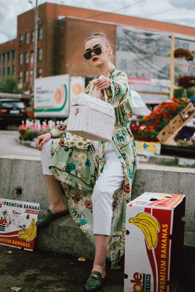 Boohoo green maxi floral kimono, floral print kimono, mango white peg trousers with belt, zara white cami top, musette tropical print leather mules, white handmade basket bag, andreea birsan, couturezilla, cute spring and summer outfit ideas 2018, white straw bag, raffia bag, wicker bag, limited edition mango bag, the cutest bags from mango, bamboo bag, tropical print and floral print, how to mix different prints in one outfit, the not so boring all white outfit for spring and summer, how to wear wide leg trousers, the peg trousers trend, pleated pants, white pants, how to wear white trousers, simple white cami top, wardrobe staples, wardrobe classics, big sunglasses, oversized sunglasses, oversize sunglasses, smoked lens sunglasses, moon necklace, white pants and top, kimono, maxi kimono, how to wear a kimono, the best way to wear a kimono in spring and summer, the popular zara sold out floral print kimono, the zara kimono, how to look Parisian chic, European summer street style inspiration for women 2017, pinterest chic outfit ideas for woman, summer outfit ideas, summer ootd inspiration, outfit of the day, ootd, fashion icon, style inspiration, fashionista, fashion inspiration, style inspo, what to wear in summer, how to look French, chic on a budget, zara outfit, mango, topshop, asos, river island, forever 21, urban outfitters, how to mix high end pieces with luxury ones, zara and Gucci,outfit alternatives for summer, tomboy chic, minimal outfit, tumblr girls photos, pictures, happy girl, women, smart casual outfits, the best outfit ideas 2017, what to wear when you don’t feel inspired, summer in Europe, weekend attire, uniform, French women in summer, European outfit ideas 2017, minimal chic outfit, how to stand out, the best outfit ideas for summer, the sunglasses you have seen everywhere on Instagram, glasses, uk fashion blogger, united kingdom, uk fashion blog, fashion and travel blog, Europe, women with style, street style, summer fashion trends 2017, best fashion ideas, styling, fall fashion, fall outfit, fall ootd, fall perfect, transitional dressing, best transitional outfit ideas, how to wear statement earrings, dressing for autumn, autumn outfit, winter outfit ideas for work and school 2017