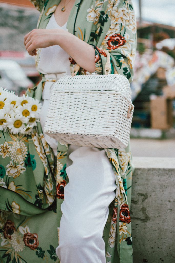 Boohoo green maxi floral kimono, floral print kimono, mango white peg trousers with belt, zara white cami top, musette tropical print leather mules, white handmade basket bag, andreea birsan, couturezilla, cute spring and summer outfit ideas 2018, white straw bag, raffia bag, wicker bag, limited edition mango bag, the cutest bags from mango, bamboo bag, tropical print and floral print, how to mix different prints in one outfit, the not so boring all white outfit for spring and summer, how to wear wide leg trousers, the peg trousers trend, pleated pants, white pants, how to wear white trousers, simple white cami top, wardrobe staples, wardrobe classics, big sunglasses, oversized sunglasses, oversize sunglasses, smoked lens sunglasses, moon necklace, white pants and top, kimono, maxi kimono, how to wear a kimono, the best way to wear a kimono in spring and summer, the popular zara sold out floral print kimono, the zara kimono, how to look Parisian chic, European summer street style inspiration for women 2017, pinterest chic outfit ideas for woman, summer outfit ideas, summer ootd inspiration, outfit of the day, ootd, fashion icon, style inspiration, fashionista, fashion inspiration, style inspo, what to wear in summer, how to look French, chic on a budget, zara outfit, mango, topshop, asos, river island, forever 21, urban outfitters, how to mix high end pieces with luxury ones, zara and Gucci,outfit alternatives for summer, tomboy chic, minimal outfit, tumblr girls photos, pictures, happy girl, women, smart casual outfits, the best outfit ideas 2017, what to wear when you don’t feel inspired, summer in Europe, weekend attire, uniform, French women in summer, European outfit ideas 2017, minimal chic outfit, how to stand out, the best outfit ideas for summer, the sunglasses you have seen everywhere on Instagram, glasses, uk fashion blogger, united kingdom, uk fashion blog, fashion and travel blog, Europe, women with style, street style, summer fashion trends 2017, best fashion ideas, styling, fall fashion, fall outfit, fall ootd, fall perfect, transitional dressing, best transitional outfit ideas, how to wear statement earrings, dressing for autumn, autumn outfit, winter outfit ideas for work and school 2017