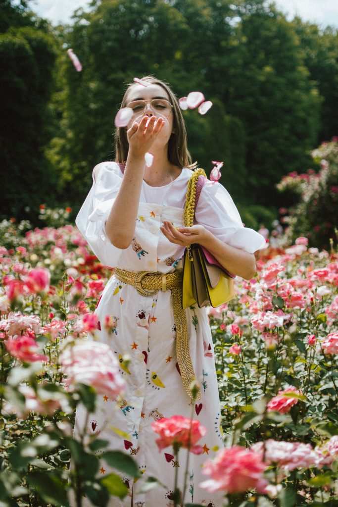 White puffy sleeves shirt, layered button front midi dress, gold metallic vintage belt, colorblock leather shoulder bag, pink mules, rose gorden editorial, andreea birsan, couturezilla, cute summer outfit ideas for 2018, step up your midi dress, how to wear a midi dress, printed dress, cotton dress, ottod’ame dress, rose gardens in bucharest, trandafiri bucuresti, gradina botanica, botanical garden, fun dress, cotton and linen, white shirt with puffy sleeves, the perfect midi dress for summer, marcie wconcept pink suede mules, korean shoes, korean mules, korean designer shoes, italian dress, beautiful bag, statement bag, yellow and pink shoulder bag, statement bag strap, isla fontaine bags, italian leather bags, how to layer a midi dress when it’s melting outside, the midi dress you should wear this summer, how to wear a puffy sleeve top, white shirt, wardrobe must have, staples, how to look Parisian chic, European summer street style inspiration for women 2017, pinterest chic outfit ideas for woman, summer outfit ideas, summer ootd inspiration, outfit of the day, ootd, fashion icon, style inspiration, fashionista, fashion inspiration, style inspo, what to wear in summer, how to look French, chic on a budget, zara outfit, mango, topshop, asos, river island, forever 21, urban outfitters, how to mix high end pieces with luxury ones, zara and Gucci,outfit alternatives for summer, tomboy chic, minimal outfit, tumblr girls photos, pictures, happy girl, women, smart casual outfits, the best outfit ideas 2017, what to wear when you don’t feel inspired, summer in Europe, weekend attire, uniform, French women in summer, European outfit ideas 2017, minimal chic outfit, how to stand out, the best outfit ideas for summer, the sunglasses you have seen everywhere on Instagram, glasses, uk fashion blogger, united kingdom, uk fashion blog, fashion and travel blog, Europe, women with style, street style, summer fashion trends 2017, best fashion ideas, styling, fall fashion, fall outfit, fall ootd, fall perfect, transitional dressing, best transitional outfit ideas, how to wear statement earrings, dressing for autumn, autumn outfit, winter outfit ideas for work and school 2017, clear lens aviator glasses, geeky glasses, clear lens glasses trend