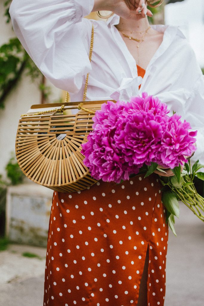 Orange boohoo midi polka dot midi dress, mango white balloon sleeve shirt shirt, h&m natural straw hat, cult gaia ark bag, tommy hilfiger white sneakers, andreea birsan, couturezilla, cute summer outfit ideas 2018. white trainers and dress, midi dress and sneakers, what to wear with a polka dot dress, midi polka dot dress with slit, orange dress, how to wear orange, what to wear with orange, rust color dress, what colors to wear this summer, how to wear sneakers and dresses, mixing feminine with masculine elements, athleisure, sexy polka dot dress, boater hat, cult gaia ark inspired bag, petite sardine bag, portuguese bag, bamboo bag, how to wear a white shirt, button up shirt, cotton shirt, how to layer in summer, layered summer dress, summer layers, white sneakers, white trainers, tommy hilfiger, gold accessories, small cat eye sunglasses, 90s inspired sunglasses, micro sunglasses trend, mini sunglasses, cat eye sunnies, the sold out asos sunglasses, chic bags to wear in spring and summer, raffia bag, straw bag, handmade bag, peonies, how to look Parisian chic, European summer street style inspiration for women 2017, pinterest chic outfit ideas for woman, summer outfit ideas, summer ootd inspiration, outfit of the day, ootd, fashion icon, style inspiration, fashionista, fashion inspiration, style inspo, what to wear in summer, how to look French, chic on a budget, zara outfit, mango, topshop, asos, river island, forever 21, urban outfitters, how to mix high end pieces with luxury ones, zara and Gucci,outfit alternatives for summer, tomboy chic, minimal outfit, tumblr girls photos, pictures, happy girl, women, smart casual outfits, the best outfit ideas 2017, what to wear when you don’t feel inspired, summer in Europe, weekend attire, uniform, French women in summer, European outfit ideas 2017, minimal chic outfit, how to stand out, the best outfit ideas for summer, the sunglasses you have seen everywhere on Instagram, glasses, uk fashion blogger, united kingdom, uk fashion blog, fashion and travel blog, Europe, women with style, street style, summer fashion trends 2017, best fashion ideas, styling, fall fashion, fall outfit, fall ootd, fall perfect, transitional dressing, best transitional outfit ideas, how to wear statement earrings, dressing for autumn, autumn outfit, winter outfit ideas for work and school 2017