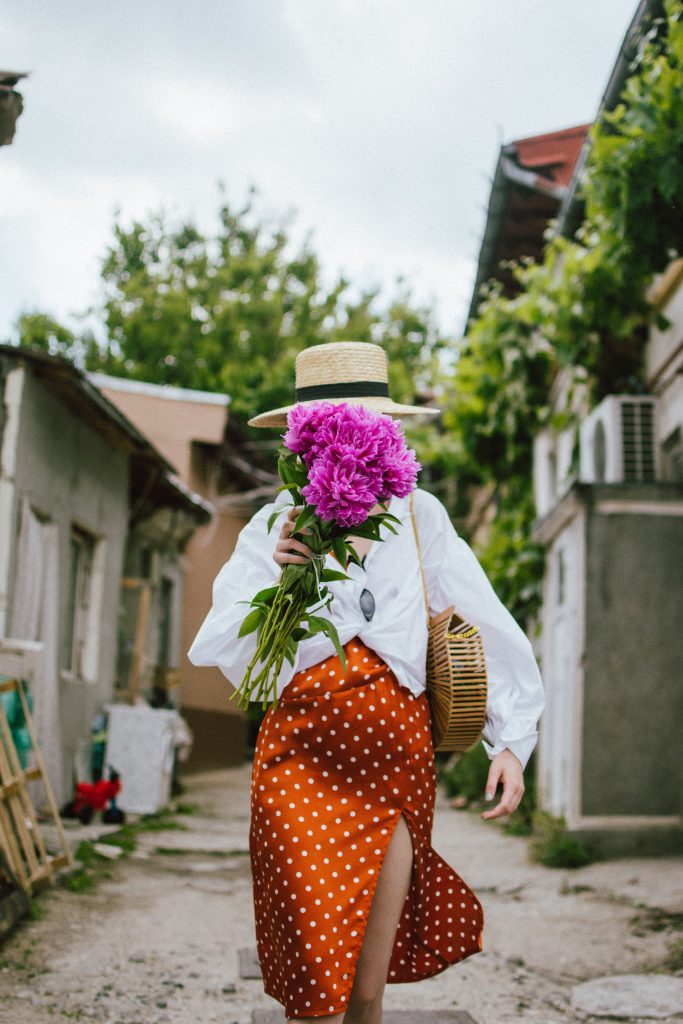 Orange boohoo midi polka dot midi dress, mango white balloon sleeve shirt shirt, h&m natural straw hat, cult gaia ark bag, tommy hilfiger white sneakers, andreea birsan, couturezilla, cute summer outfit ideas 2018. white trainers and dress, midi dress and sneakers, what to wear with a polka dot dress, midi polka dot dress with slit, orange dress, how to wear orange, what to wear with orange, rust color dress, what colors to wear this summer, how to wear sneakers and dresses, mixing feminine with masculine elements, athleisure, sexy polka dot dress, boater hat, cult gaia ark inspired bag, petite sardine bag, portuguese bag, bamboo bag, how to wear a white shirt, button up shirt, cotton shirt, how to layer in summer, layered summer dress, summer layers, white sneakers, white trainers, tommy hilfiger, gold accessories, small cat eye sunglasses, 90s inspired sunglasses, micro sunglasses trend, mini sunglasses, cat eye sunnies, the sold out asos sunglasses, chic bags to wear in spring and summer, raffia bag, straw bag, handmade bag, peonies, how to look Parisian chic, European summer street style inspiration for women 2017, pinterest chic outfit ideas for woman, summer outfit ideas, summer ootd inspiration, outfit of the day, ootd, fashion icon, style inspiration, fashionista, fashion inspiration, style inspo, what to wear in summer, how to look French, chic on a budget, zara outfit, mango, topshop, asos, river island, forever 21, urban outfitters, how to mix high end pieces with luxury ones, zara and Gucci,outfit alternatives for summer, tomboy chic, minimal outfit, tumblr girls photos, pictures, happy girl, women, smart casual outfits, the best outfit ideas 2017, what to wear when you don’t feel inspired, summer in Europe, weekend attire, uniform, French women in summer, European outfit ideas 2017, minimal chic outfit, how to stand out, the best outfit ideas for summer, the sunglasses you have seen everywhere on Instagram, glasses, uk fashion blogger, united kingdom, uk fashion blog, fashion and travel blog, Europe, women with style, street style, summer fashion trends 2017, best fashion ideas, styling, fall fashion, fall outfit, fall ootd, fall perfect, transitional dressing, best transitional outfit ideas, how to wear statement earrings, dressing for autumn, autumn outfit, winter outfit ideas for work and school 2017