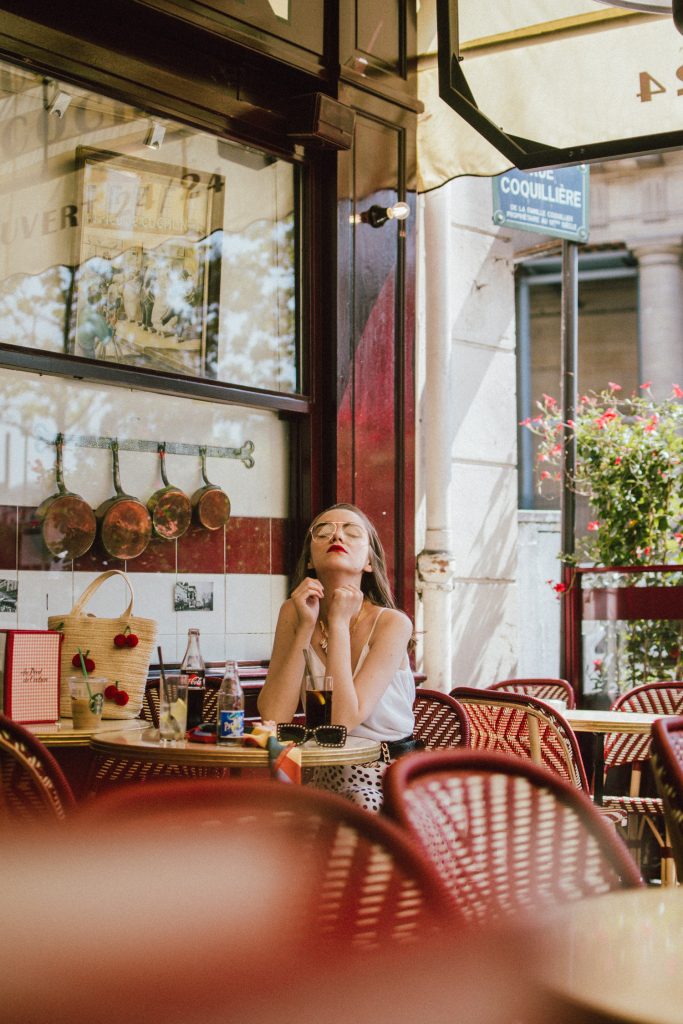 Zara polka dot skirt, white cami top, gucci ace heart sneakers, cherry pom pom straw summer bag, paris, andreea birsan, couturezilla, cute summer outfit ideas 2018, polka dot midi skirt, spaghetti straps white camisole top, mango white, white and black midi skirt, the zara sold out polka dot skirt, basic white cami top, how to wear a midi skirt, what to wear with a midi polka dot skirt, how to style a polka dot skirt, how to wear a polka dot skirt, gucci trainers, gucci ace heart embroidered sneakers, white trainers, heart embroidery, white leather shoes, parisian cafe, skirt and sneakers, shell accessories, shell necklaces, gold layered necklaces, gucci inspired embellished square sunglasses, 90s sunglasses, black sunglasses, printed silk scarf, clear lens aviator glasses, zara glasses, the geeky glasses trend, the clear lens glasses trend you’ve seen on instagram, popular glasses, gucci 90s inspired square embellished sunglasses with rhinestones, pom pom summer bag, straw bag, asos sold out summer bag, raffia tote bag, statement summer bag, how to look Parisian chic, European summer street style inspiration for women 2017, pinterest chic outfit ideas for woman, summer outfit ideas, summer ootd inspiration, outfit of the day, ootd, fashion icon, style inspiration, fashionista, fashion inspiration, style inspo, what to wear in summer, how to look French, chic on a budget, zara outfit, mango, topshop, asos, river island, forever 21, urban outfitters, how to mix high end pieces with luxury ones, zara and Gucci,outfit alternatives for summer, tomboy chic, minimal outfit, tumblr girls photos, pictures, happy girl, women, smart casual outfits, the best outfit ideas 2017, what to wear when you don’t feel inspired, summer in Europe, weekend attire, uniform, French women in summer, European outfit ideas 2017, minimal chic outfit, how to stand out, the best outfit ideas for summer, the sunglasses you have seen everywhere on Instagram, glasses, uk fashion blogger, united kingdom, uk fashion blog, fashion and travel blog, Europe, women with style, street style, summer fashion trends 2017, best fashion ideas, styling, fall fashion, fall outfit, fall ootd, fall perfect, transitional dressing, best transitional outfit ideas, how to wear statement earrings, dressing for autumn, autumn outfit, winter outfit ideas for work and school 2017