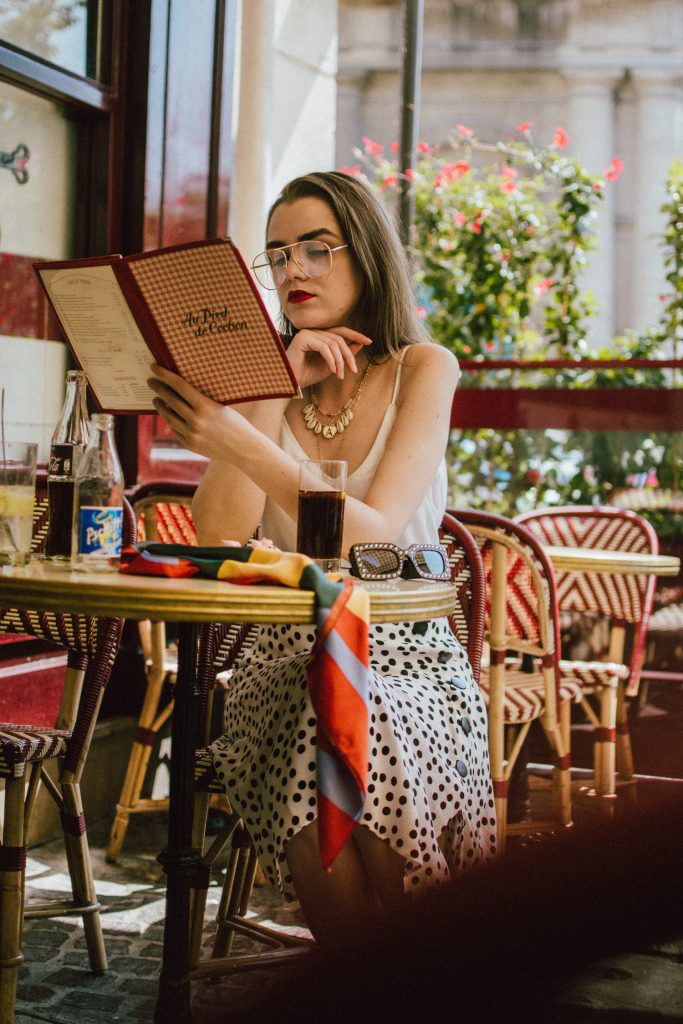 Zara polka dot skirt, white cami top, gucci ace heart sneakers, cherry pom pom straw summer bag, paris, andreea birsan, couturezilla, cute summer outfit ideas 2018, polka dot midi skirt, spaghetti straps white camisole top, mango white, white and black midi skirt, the zara sold out polka dot skirt, basic white cami top, how to wear a midi skirt, what to wear with a midi polka dot skirt, how to style a polka dot skirt, how to wear a polka dot skirt, gucci trainers, gucci ace heart embroidered sneakers, white trainers, heart embroidery, white leather shoes, parisian cafe, skirt and sneakers, shell accessories, shell necklaces, gold layered necklaces, gucci inspired embellished square sunglasses, 90s sunglasses, black sunglasses, printed silk scarf, clear lens aviator glasses, zara glasses, the geeky glasses trend, the clear lens glasses trend you’ve seen on instagram, popular glasses, gucci 90s inspired square embellished sunglasses with rhinestones, pom pom summer bag, straw bag, asos sold out summer bag, raffia tote bag, statement summer bag, how to look Parisian chic, European summer street style inspiration for women 2017, pinterest chic outfit ideas for woman, summer outfit ideas, summer ootd inspiration, outfit of the day, ootd, fashion icon, style inspiration, fashionista, fashion inspiration, style inspo, what to wear in summer, how to look French, chic on a budget, zara outfit, mango, topshop, asos, river island, forever 21, urban outfitters, how to mix high end pieces with luxury ones, zara and Gucci,outfit alternatives for summer, tomboy chic, minimal outfit, tumblr girls photos, pictures, happy girl, women, smart casual outfits, the best outfit ideas 2017, what to wear when you don’t feel inspired, summer in Europe, weekend attire, uniform, French women in summer, European outfit ideas 2017, minimal chic outfit, how to stand out, the best outfit ideas for summer, the sunglasses you have seen everywhere on Instagram, glasses, uk fashion blogger, united kingdom, uk fashion blog, fashion and travel blog, Europe, women with style, street style, summer fashion trends 2017, best fashion ideas, styling, fall fashion, fall outfit, fall ootd, fall perfect, transitional dressing, best transitional outfit ideas, how to wear statement earrings, dressing for autumn, autumn outfit, winter outfit ideas for work and school 2017