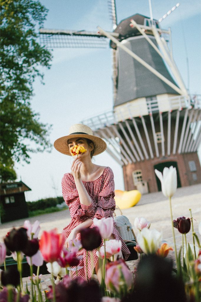 Keukenhof, red gingham dress, midi dress, gucci sneakers, straw bag, andreea birsan, couturezilla, cute summer outfit ideas 2018, when to visit the tulip fields in the netherlands, the best time to visit the dutch tulip fields, the keukenhof gardens, plan a trip to the netherlands, holland, dutch tulips, dutch tulip garden near amsterdam, the most beautiful park in europe, where to find the most beautiful flowers for photos, instagram worthy spots in holland, the popular tulip fields from instagram, the best time for visiting the popular tulip fields you keep seeing on instagram, zara sold out midi gingham dress, h&m straw boater hat, flower fields, white dress, straw bag, the white wicker bag from mango, mango white straw box bag, box bag, handmade bamboo bag, the best summer bags, handmade bags, soap bubbles, keukenhof park, keukenhof gardens, the price for a ticket at keukenhof, how’s the weather at keukenhof, lisse, the netherlands, hollidays in the netherlands, gucci ace heart embroidered sneakers, white leather trainers, white gucci shoes, gucci white shoes with hearts, gucci ace sneakers, the best gucci sneakers, how to look Parisian chic, European summer street style inspiration for women 2017, pinterest chic outfit ideas for woman, summer outfit ideas, summer ootd inspiration, outfit of the day, ootd, fashion icon, style inspiration, fashionista, fashion inspiration, style inspo, what to wear in summer, how to look French, chic on a budget, zara outfit, mango, topshop, asos, river island, forever 21, urban outfitters, how to mix high end pieces with luxury ones, zara and Gucci,outfit alternatives for summer, tomboy chic, minimal outfit, tumblr girls photos, pictures, happy girl, women, smart casual outfits, the best outfit ideas 2017, what to wear when you don’t feel inspired, summer in Europe, weekend attire, uniform, French women in summer, European outfit ideas 2017, minimal chic outfit, how to stand out, the best outfit ideas for summer, the sunglasses you have seen everywhere on Instagram, glasses, uk fashion blogger, united kingdom, uk fashion blog, fashion and travel blog, Europe, women with style, street style, summer fashion trends 2017, best fashion ideas, styling, fall fashion, fall outfit, fall ootd, fall perfect, transitional dressing, best transitional outfit ideas, how to wear statement earrings, dressing for autumn, autumn outfit, winter outfit ideas for work and school 2017