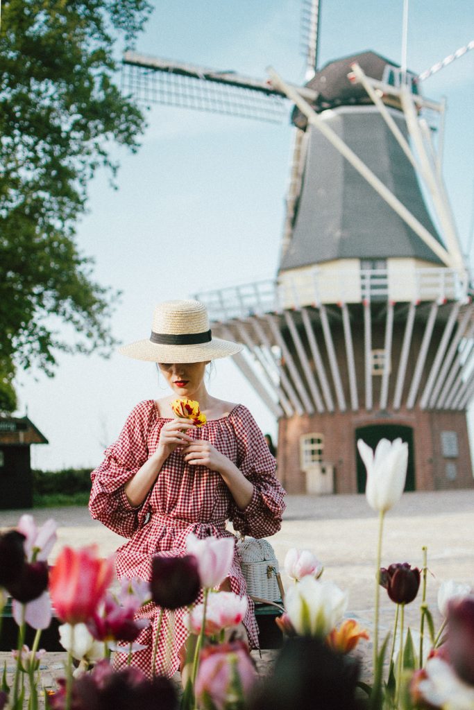 Keukenhof, red gingham dress, midi dress, gucci sneakers, straw bag, andreea birsan, couturezilla, cute summer outfit ideas 2018, when to visit the tulip fields in the netherlands, the best time to visit the dutch tulip fields, the keukenhof gardens, plan a trip to the netherlands, holland, dutch tulips, dutch tulip garden near amsterdam, the most beautiful park in europe, where to find the most beautiful flowers for photos, instagram worthy spots in holland, the popular tulip fields from instagram, the best time for visiting the popular tulip fields you keep seeing on instagram, zara sold out midi gingham dress, h&m straw boater hat, flower fields, white dress, straw bag, the white wicker bag from mango, mango white straw box bag, box bag, handmade bamboo bag, the best summer bags, handmade bags, soap bubbles, keukenhof park, keukenhof gardens, the price for a ticket at keukenhof, how’s the weather at keukenhof, lisse, the netherlands, hollidays in the netherlands, gucci ace heart embroidered sneakers, white leather trainers, white gucci shoes, gucci white shoes with hearts, gucci ace sneakers, the best gucci sneakers, how to look Parisian chic, European summer street style inspiration for women 2017, pinterest chic outfit ideas for woman, summer outfit ideas, summer ootd inspiration, outfit of the day, ootd, fashion icon, style inspiration, fashionista, fashion inspiration, style inspo, what to wear in summer, how to look French, chic on a budget, zara outfit, mango, topshop, asos, river island, forever 21, urban outfitters, how to mix high end pieces with luxury ones, zara and Gucci,outfit alternatives for summer, tomboy chic, minimal outfit, tumblr girls photos, pictures, happy girl, women, smart casual outfits, the best outfit ideas 2017, what to wear when you don’t feel inspired, summer in Europe, weekend attire, uniform, French women in summer, European outfit ideas 2017, minimal chic outfit, how to stand out, the best outfit ideas for summer, the sunglasses you have seen everywhere on Instagram, glasses, uk fashion blogger, united kingdom, uk fashion blog, fashion and travel blog, Europe, women with style, street style, summer fashion trends 2017, best fashion ideas, styling, fall fashion, fall outfit, fall ootd, fall perfect, transitional dressing, best transitional outfit ideas, how to wear statement earrings, dressing for autumn, autumn outfit, winter outfit ideas for work and school 2017