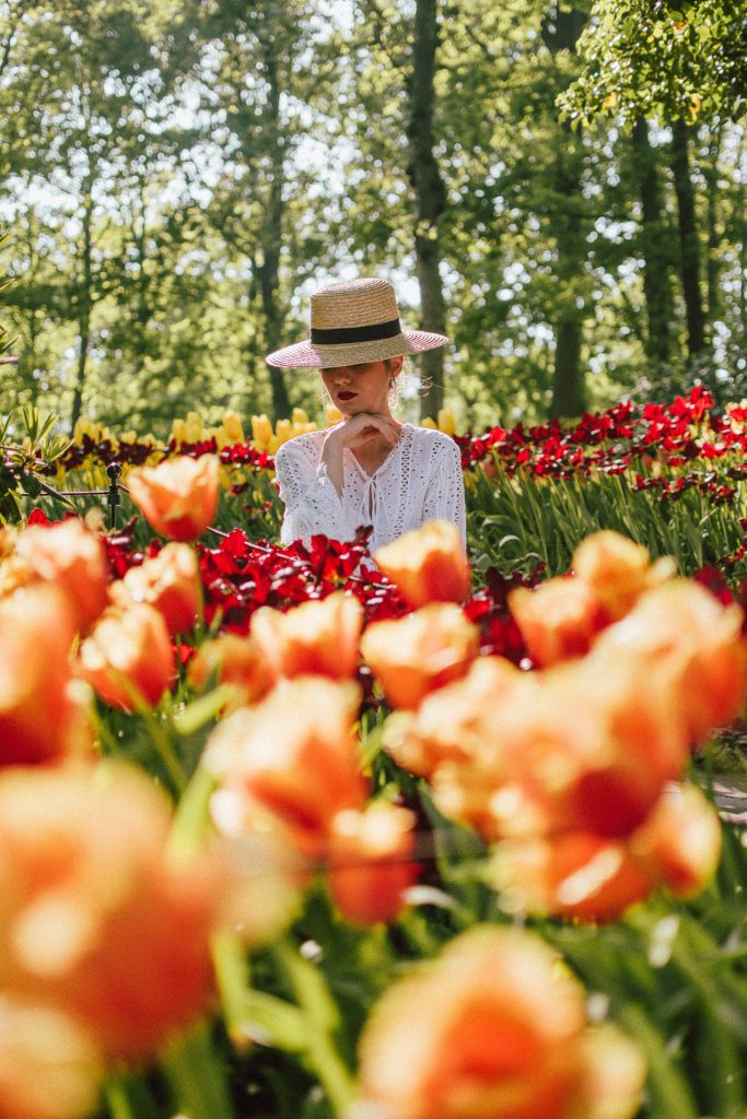 Keukenhof, red gingham dress, midi dress, gucci sneakers, straw bag, andreea birsan, couturezilla, cute summer outfit ideas 2018, when to visit the tulip fields in the netherlands, the best time to visit the dutch tulip fields, the keukenhof gardens, plan a trip to the netherlands, holland, dutch tulips, dutch tulip garden near amsterdam, the most beautiful park in europe, where to find the most beautiful flowers for photos, instagram worthy spots in holland, the popular tulip fields from instagram, the best time for visiting the popular tulip fields you keep seeing on instagram, zara sold out midi gingham dress, h&m straw boater hat, flower fields, white dress, straw bag, the white wicker bag from mango, mango white straw box bag, box bag, handmade bamboo bag, the best summer bags, handmade bags, soap bubbles, keukenhof park, keukenhof gardens, the price for a ticket at keukenhof, how’s the weather at keukenhof, lisse, the netherlands, hollidays in the netherlands, gucci ace heart embroidered sneakers, white leather trainers, white gucci shoes, gucci white shoes with hearts, gucci ace sneakers, the best gucci sneakers, how to look Parisian chic, European summer street style inspiration for women 2017, pinterest chic outfit ideas for woman, summer outfit ideas, summer ootd inspiration, outfit of the day, ootd, fashion icon, style inspiration, fashionista, fashion inspiration, style inspo, what to wear in summer, how to look French, chic on a budget, zara outfit, mango, topshop, asos, river island, forever 21, urban outfitters, how to mix high end pieces with luxury ones, zara and Gucci,outfit alternatives for summer, tomboy chic, minimal outfit, tumblr girls photos, pictures, happy girl, women, smart casual outfits, the best outfit ideas 2017, what to wear when you don’t feel inspired, summer in Europe, weekend attire, uniform, French women in summer, European outfit ideas 2017, minimal chic outfit, how to stand out, the best outfit ideas for summer, the sunglasses you have seen everywhere on Instagram, glasses, uk fashion blogger, united kingdom, uk fashion blog, fashion and travel blog, Europe, women with style, street style, summer fashion trends 2017, best fashion ideas, styling, fall fashion, fall outfit, fall ootd, fall perfect, transitional dressing, best transitional outfit ideas, how to wear statement earrings, dressing for autumn, autumn outfit, winter outfit ideas for work and school 2017